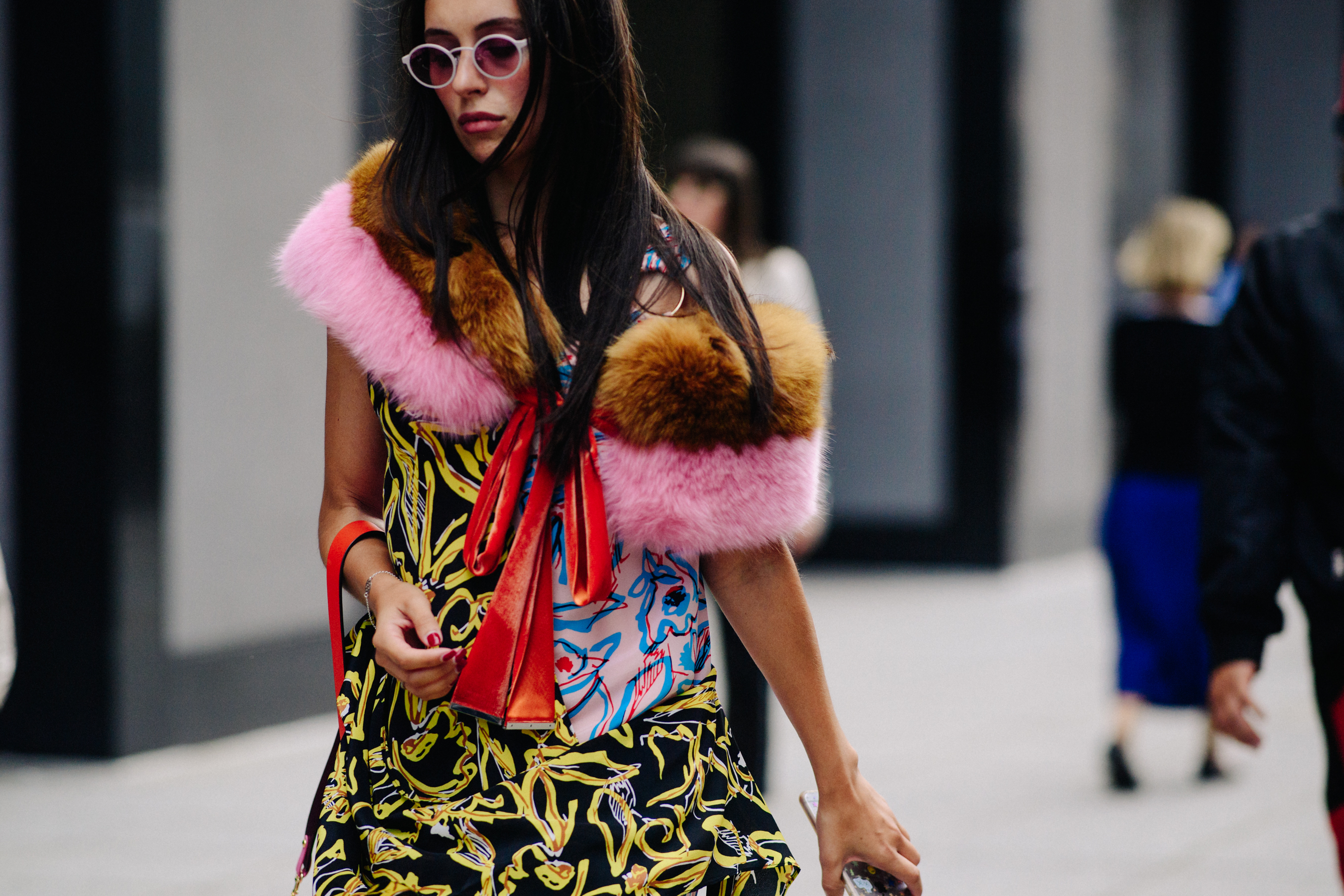 Woman wearing fur throw on