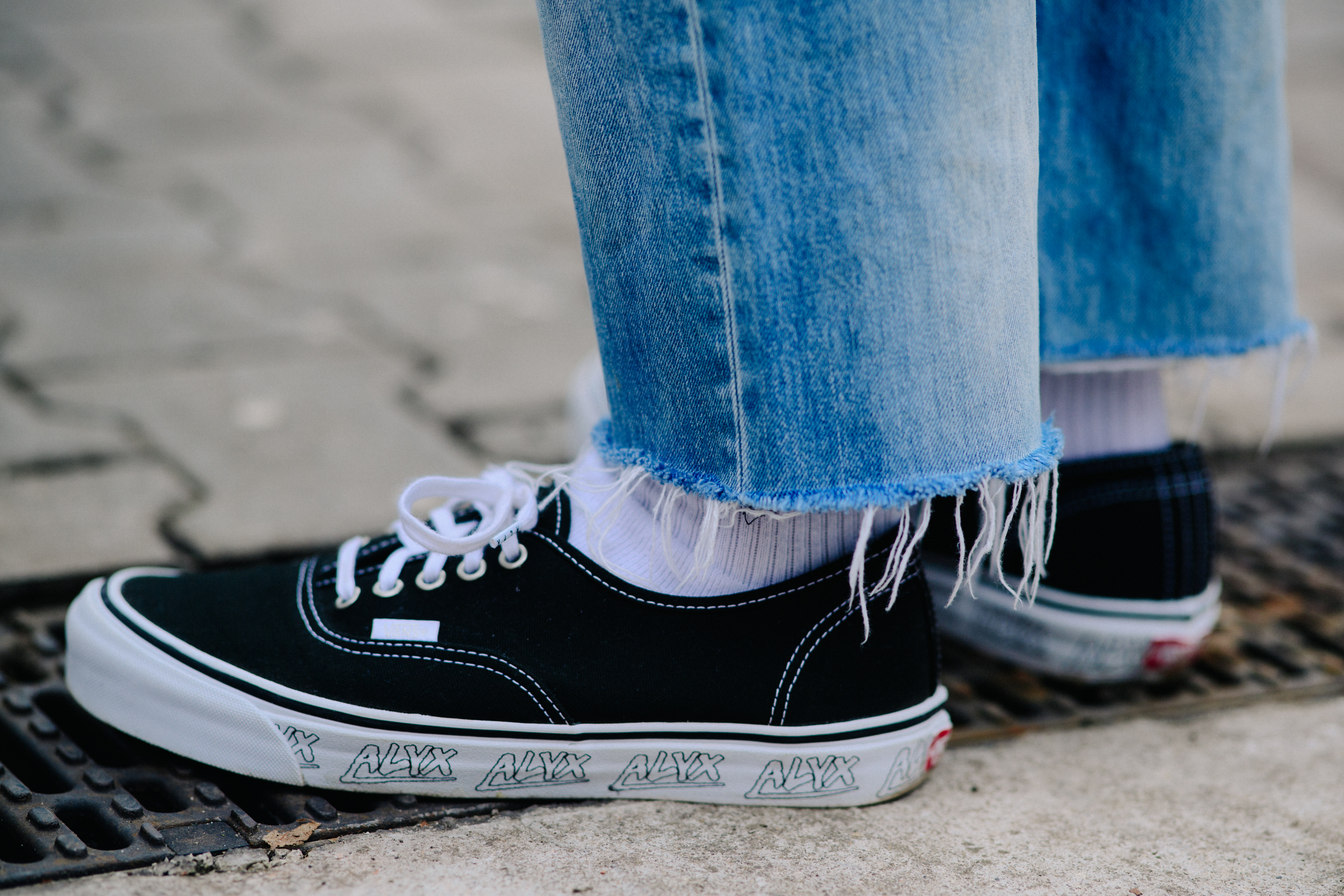 Man wearing Vans x Alyx collaboration sneakers