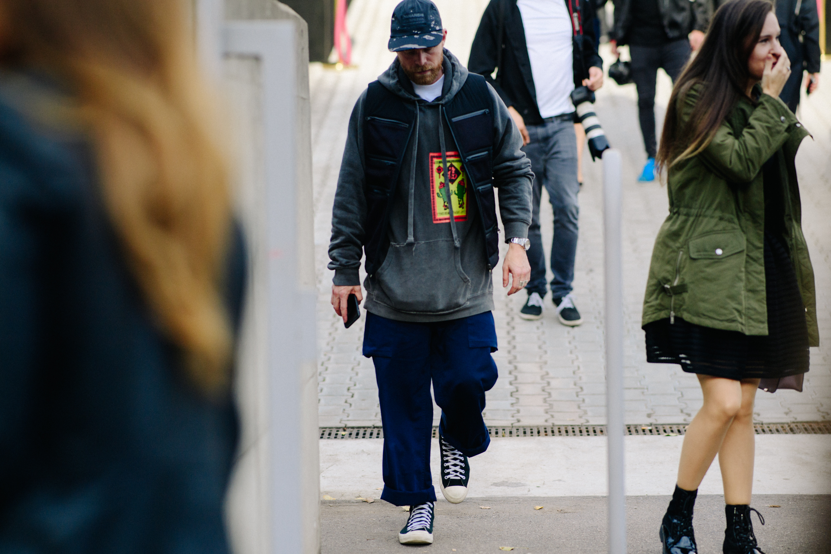 Man wearing gray hoodie