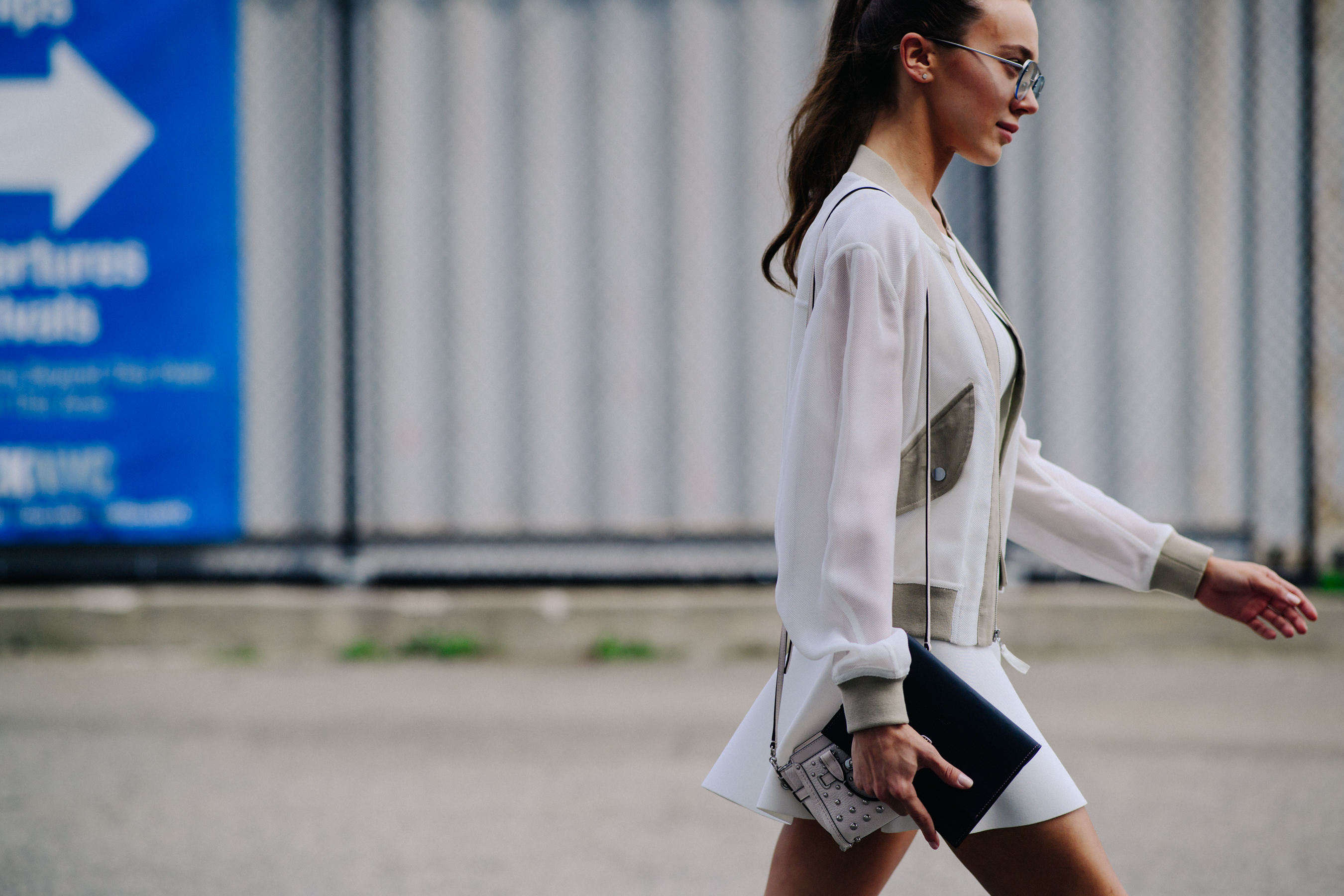 Russian-American blogger wearing white outfit