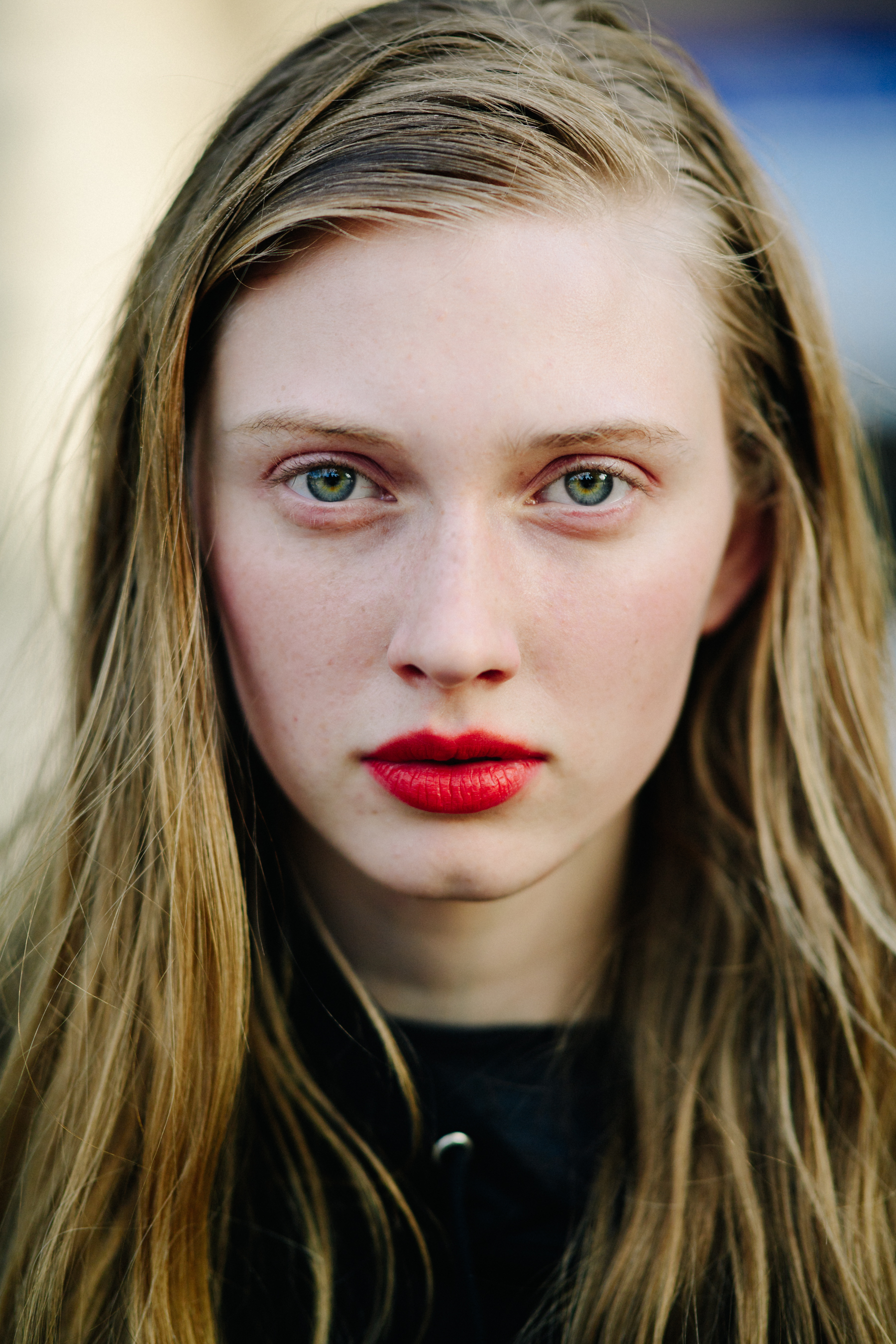 Portrait of model with green eyes and red lips