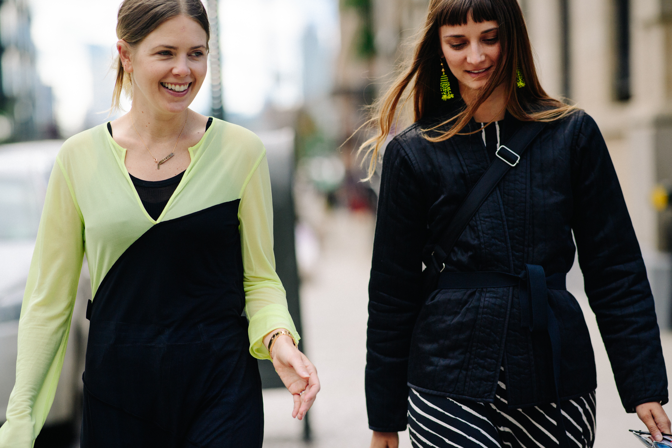 Two American editors wearing black