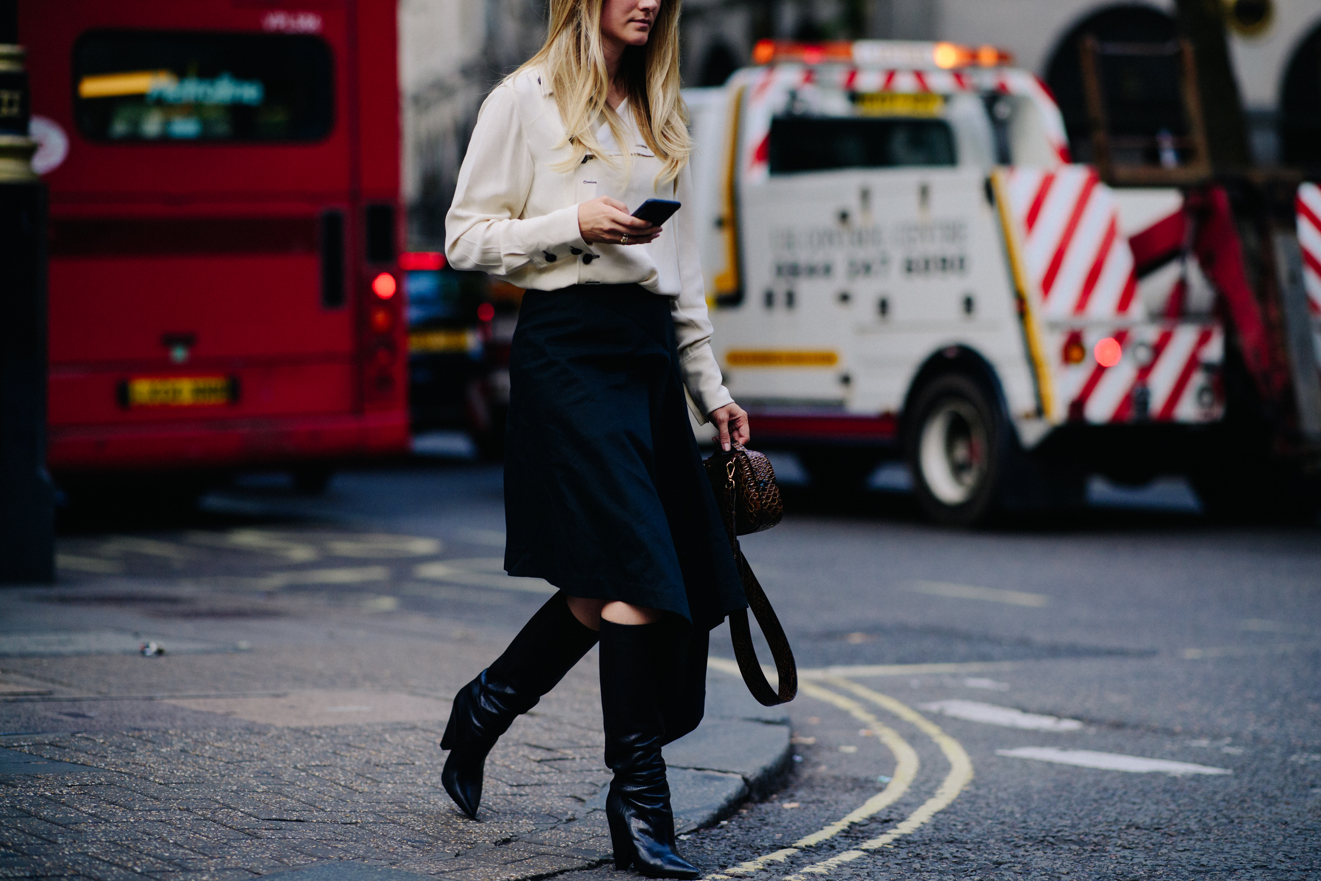 Woman wearing black boots