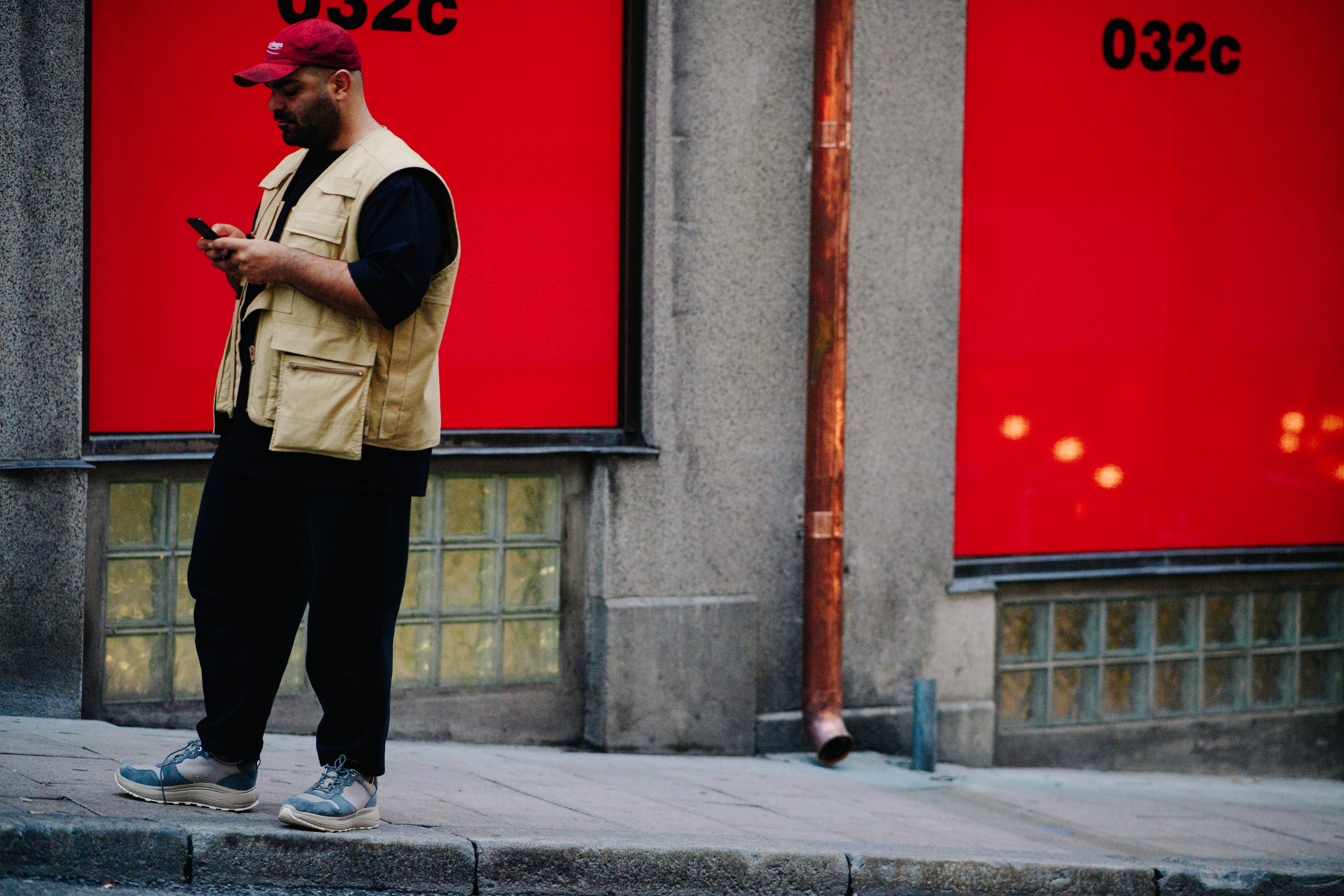 Man wearing beige utility vest