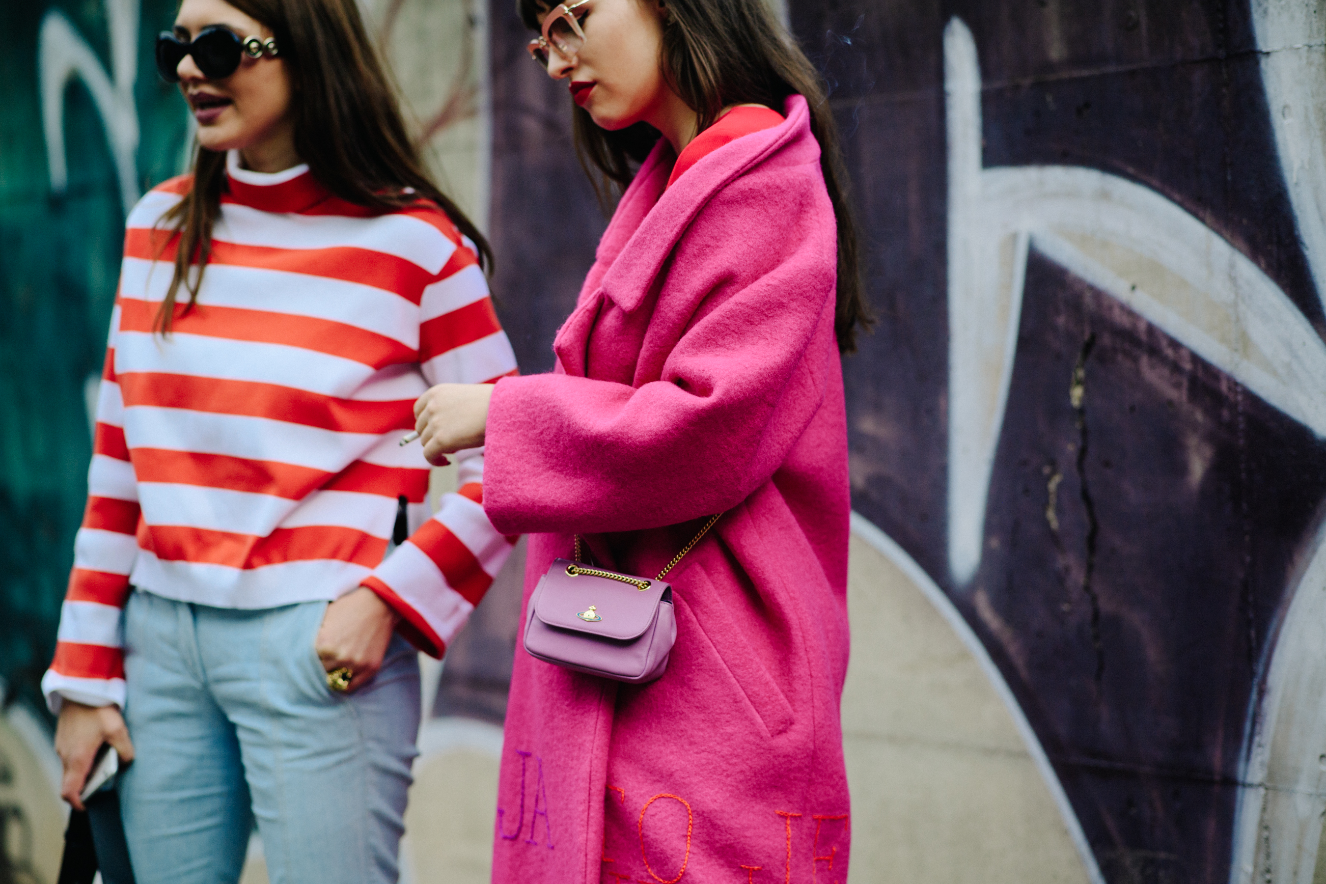 Two women wearing pink
