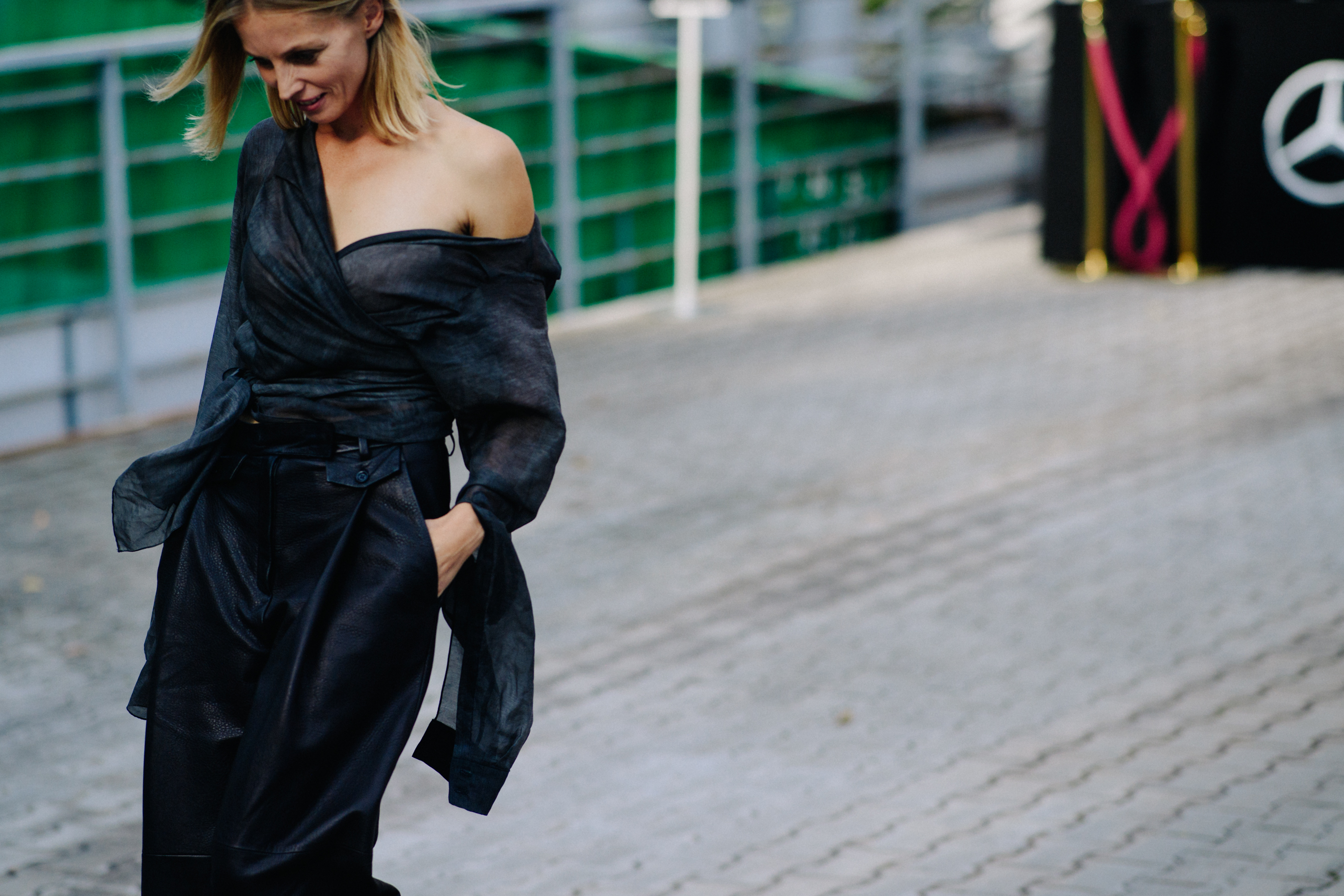 Woman wearing one shoulder dress