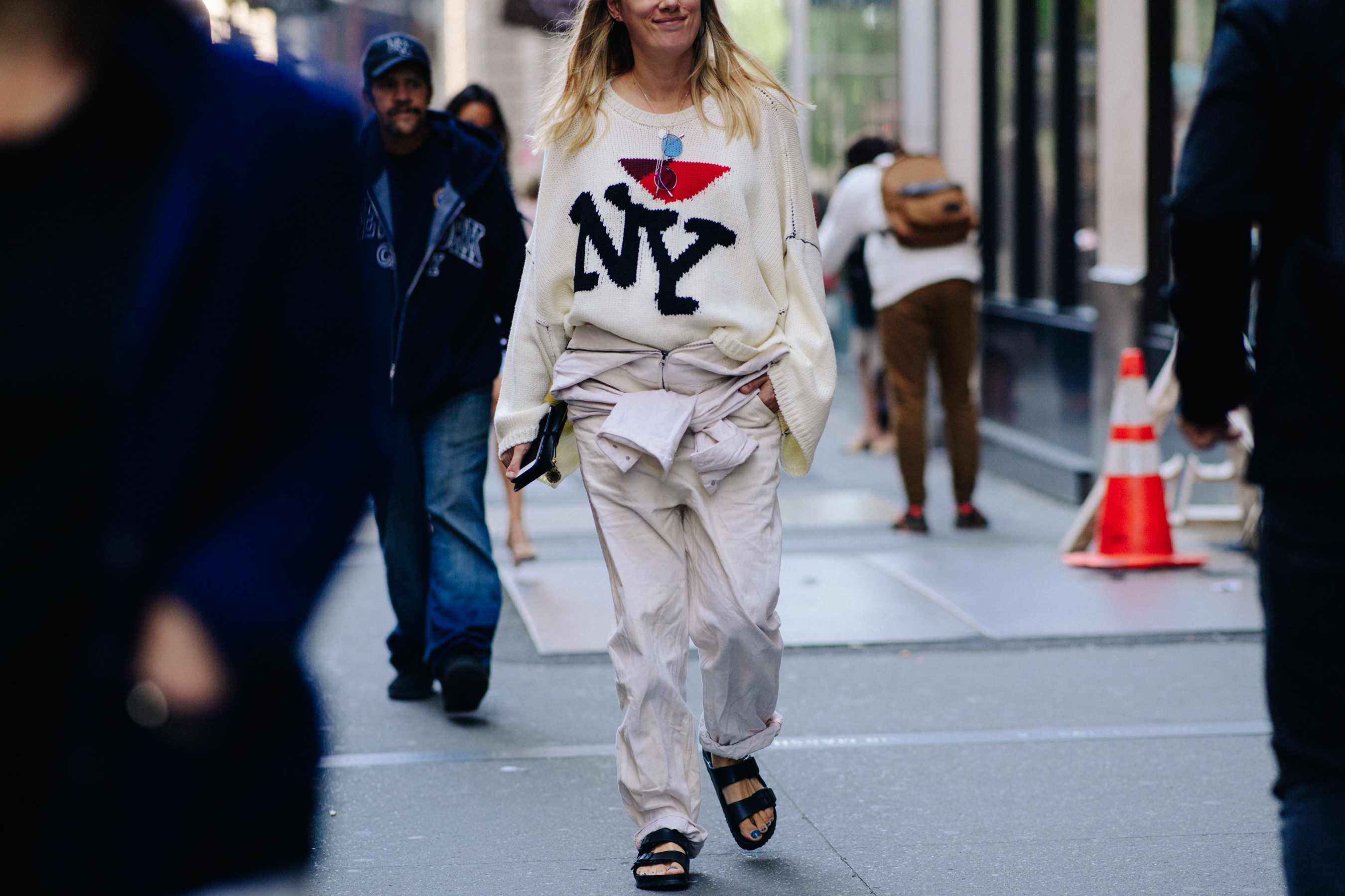 Woman wearign Raf Simons sweater