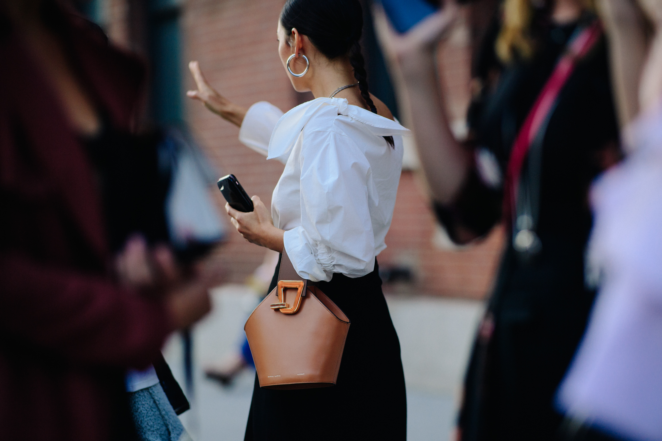 Editor wearing white top