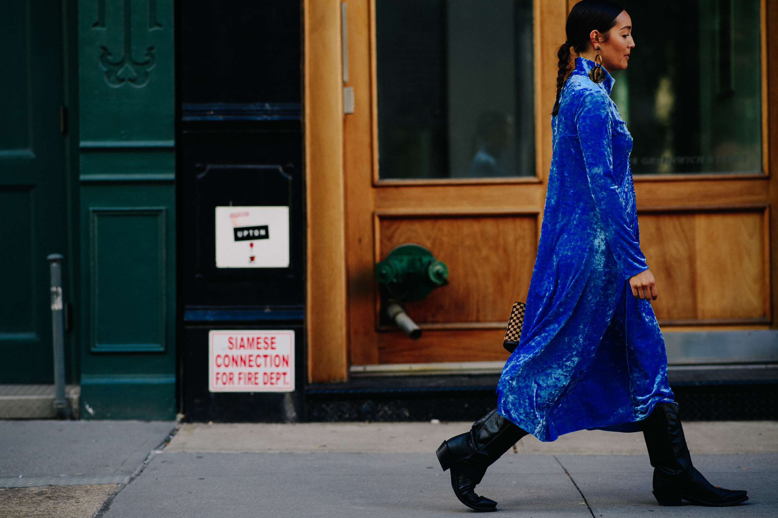 American editor wearing blue velvet dress