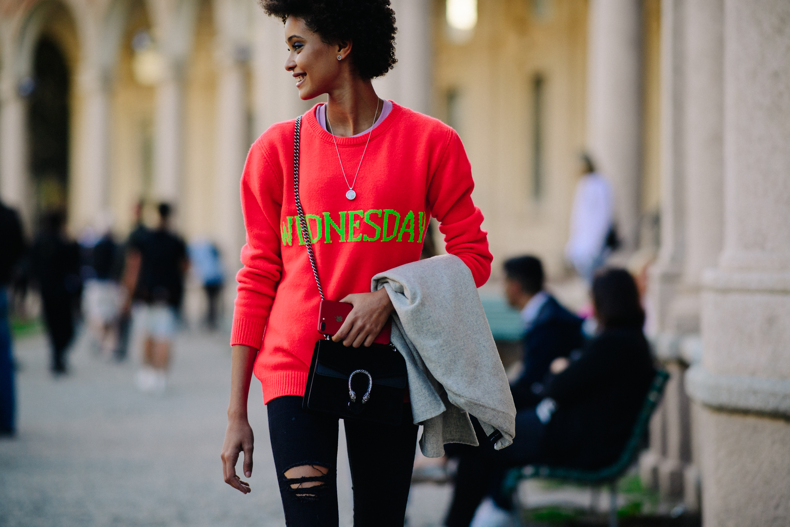 Model wearing red Gucci jumper