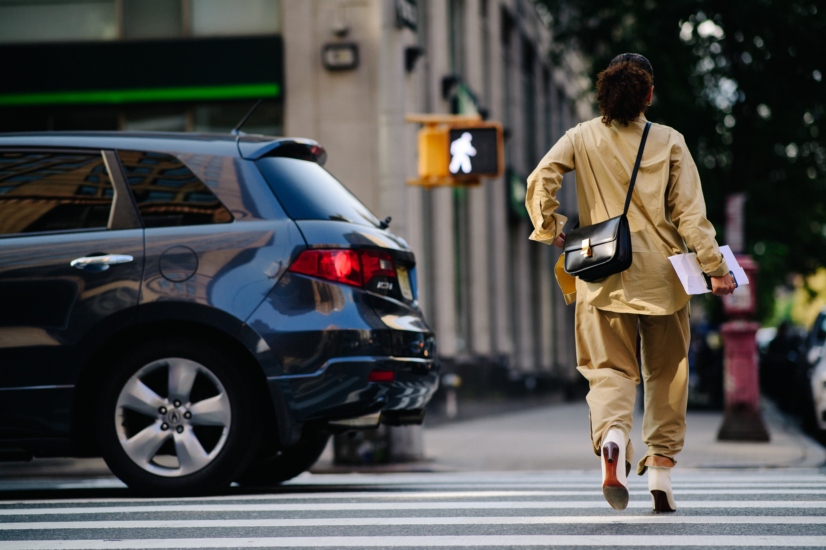 Woman wearing beige Celine outfit