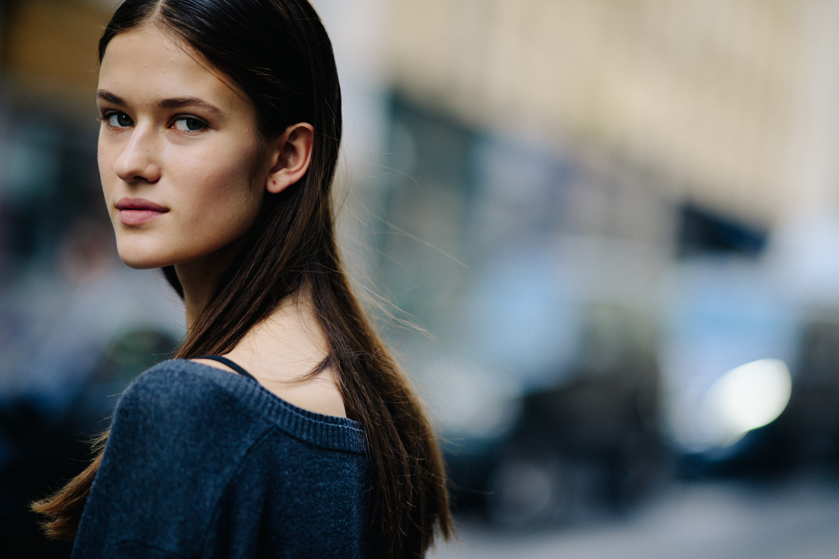 Model with long hair after a show