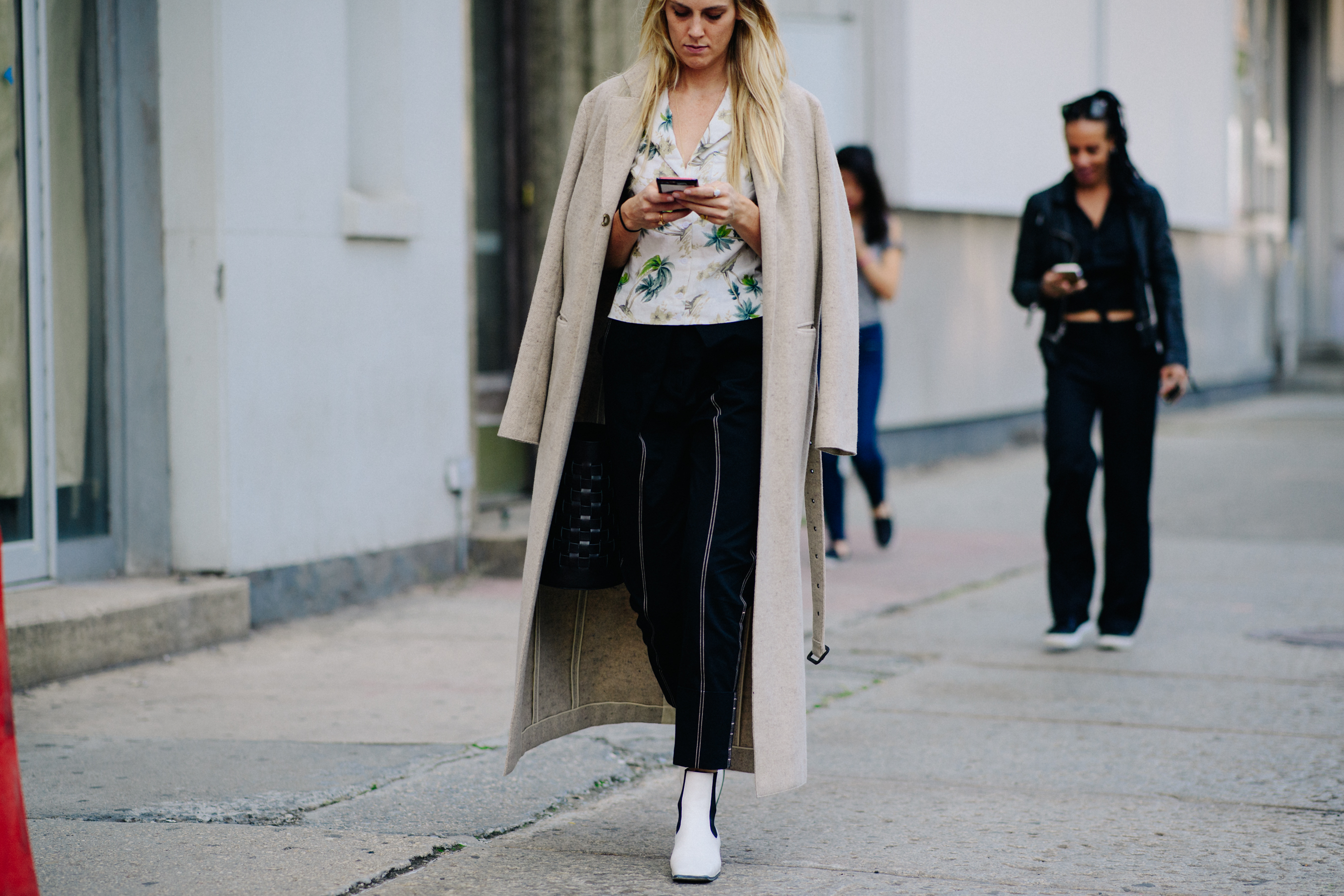 Woman wearing long beige coat