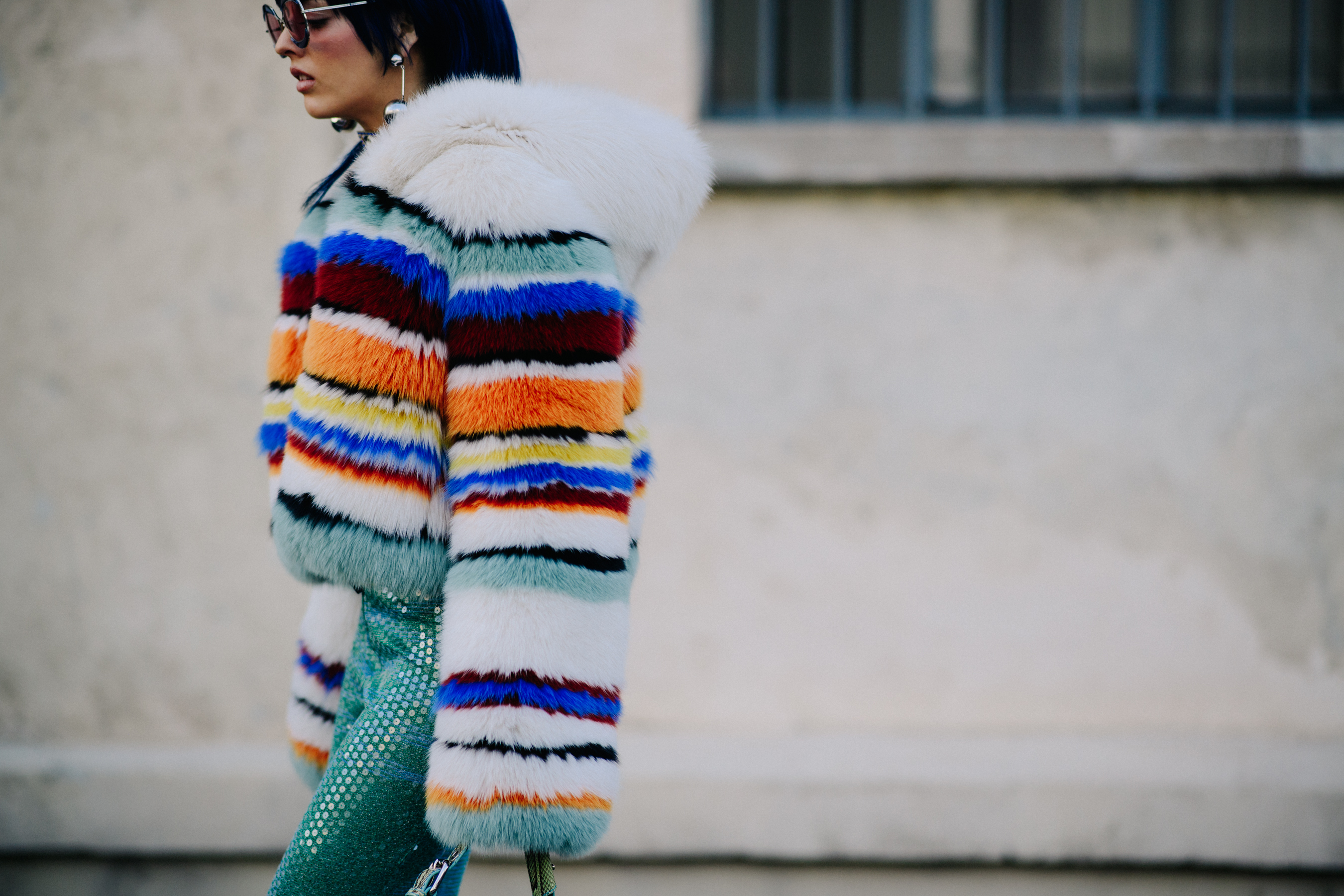 Closeup of woman in fur striped jacket