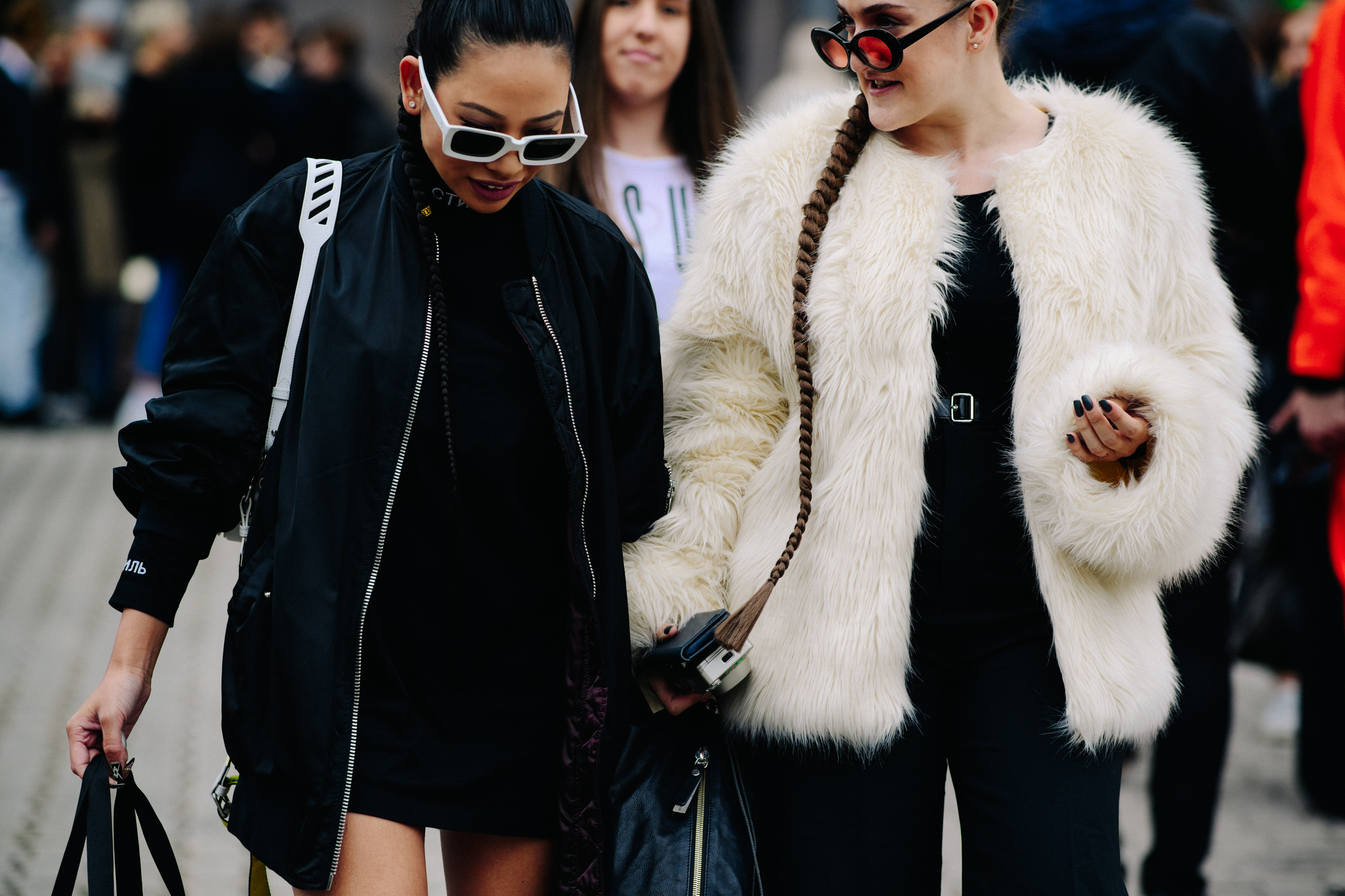 Two girls wearing white and black