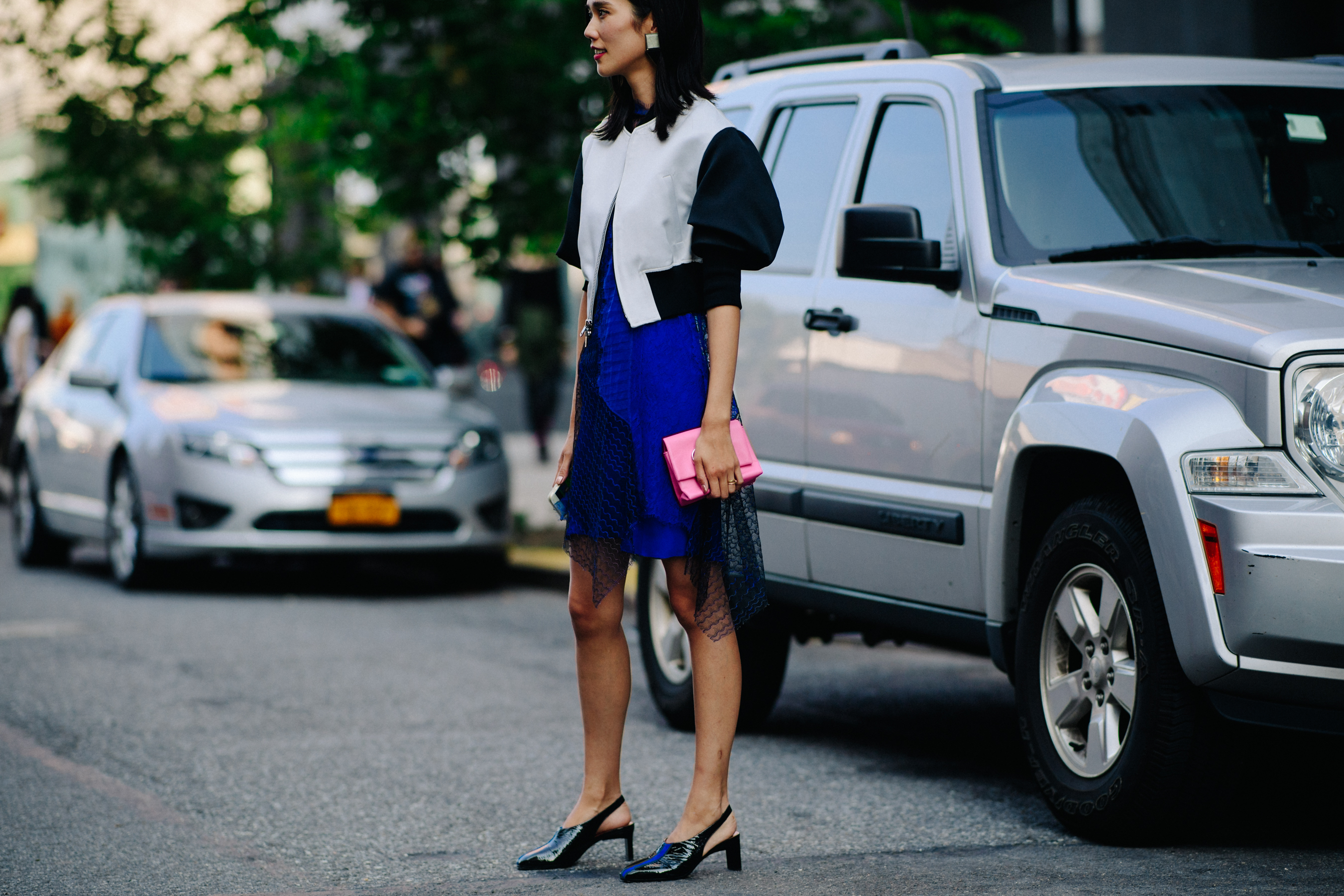 Model wearing dress and sandals