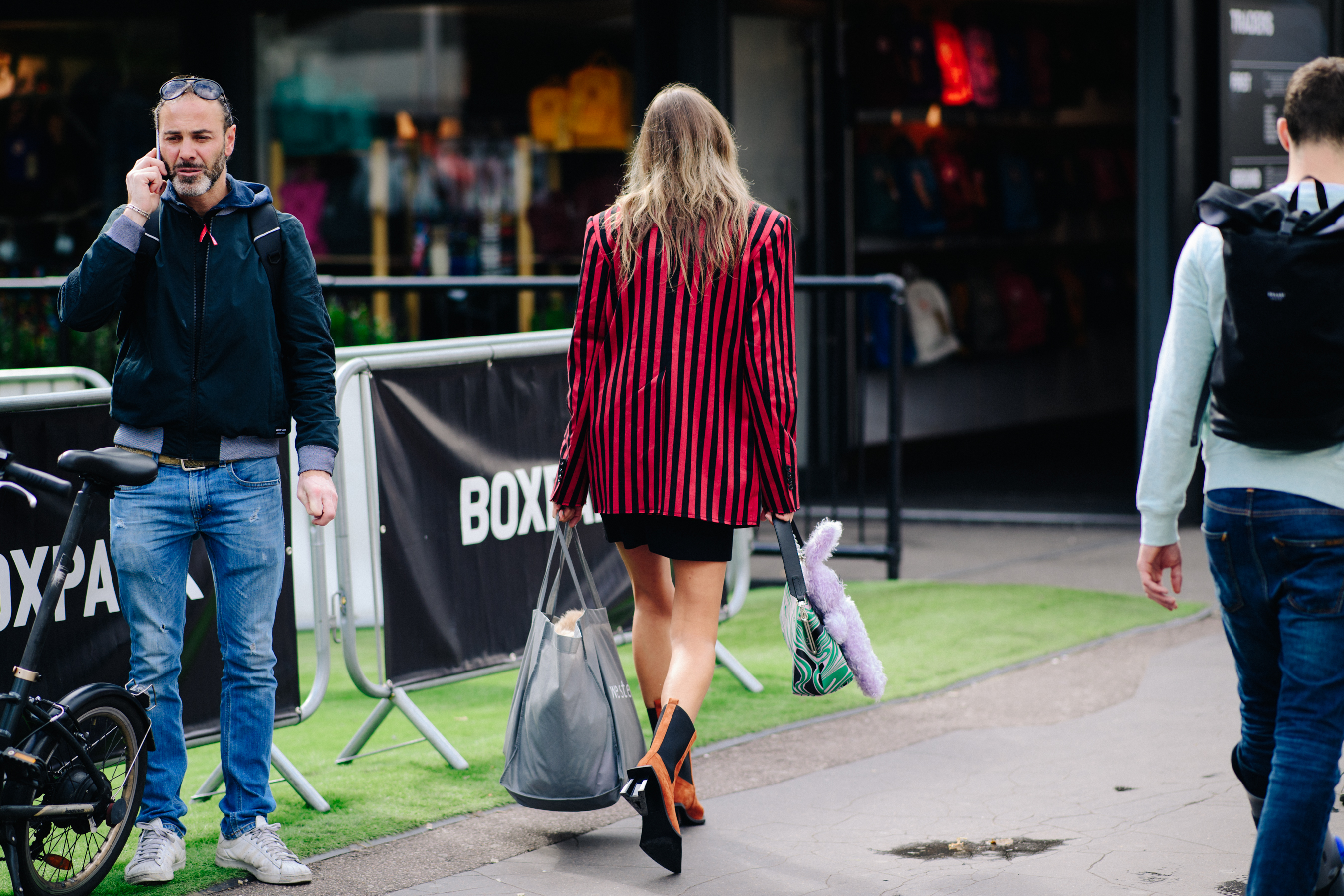 Model wearing orange boots