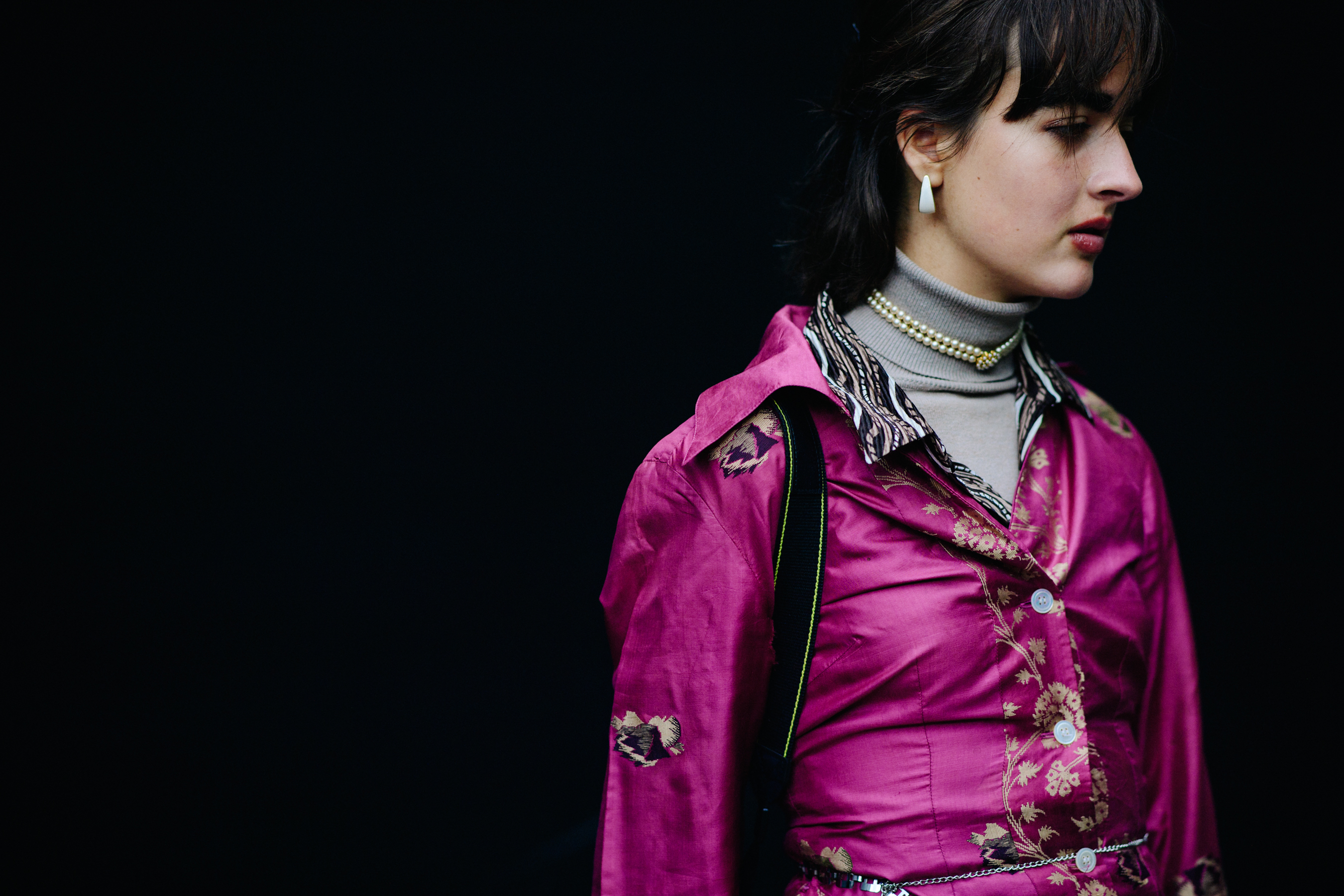 Girl wearing pink silk shirt