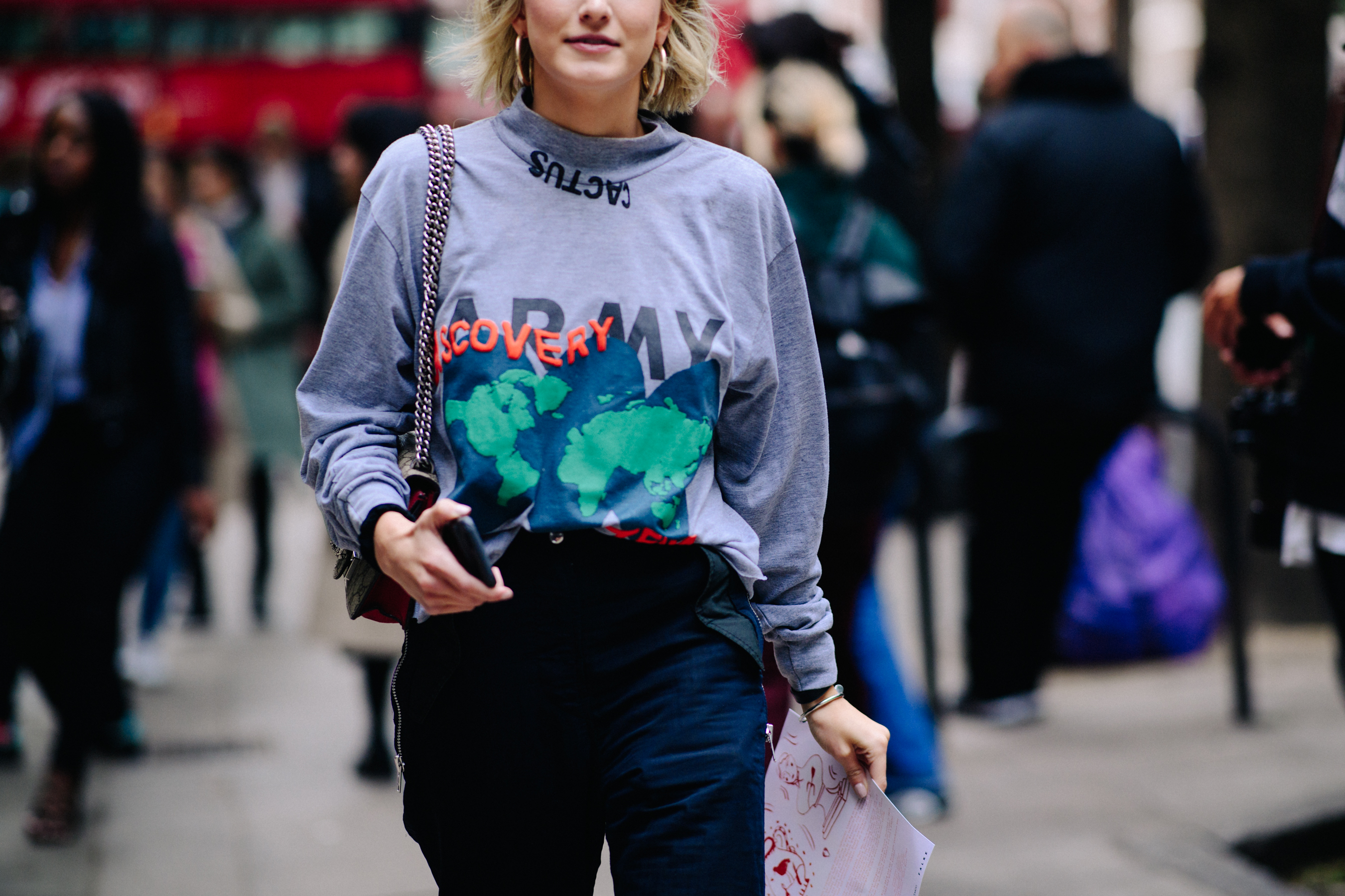 Girl wearing gray crewneck