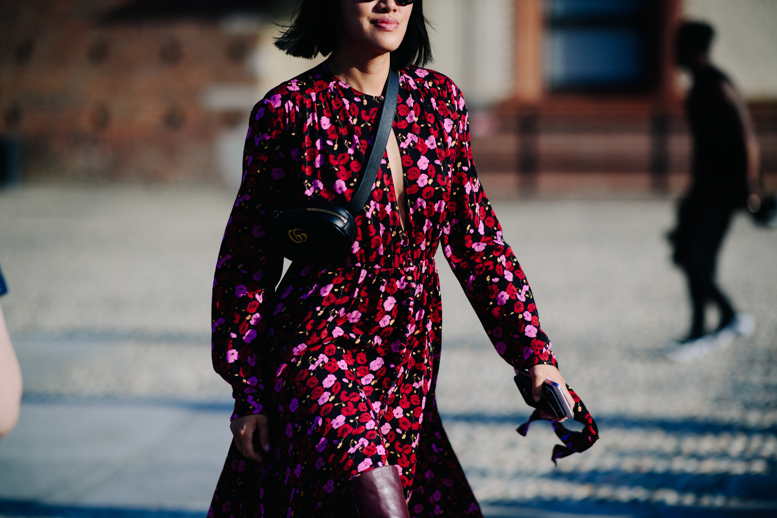 Woman wearing floral shirt dress