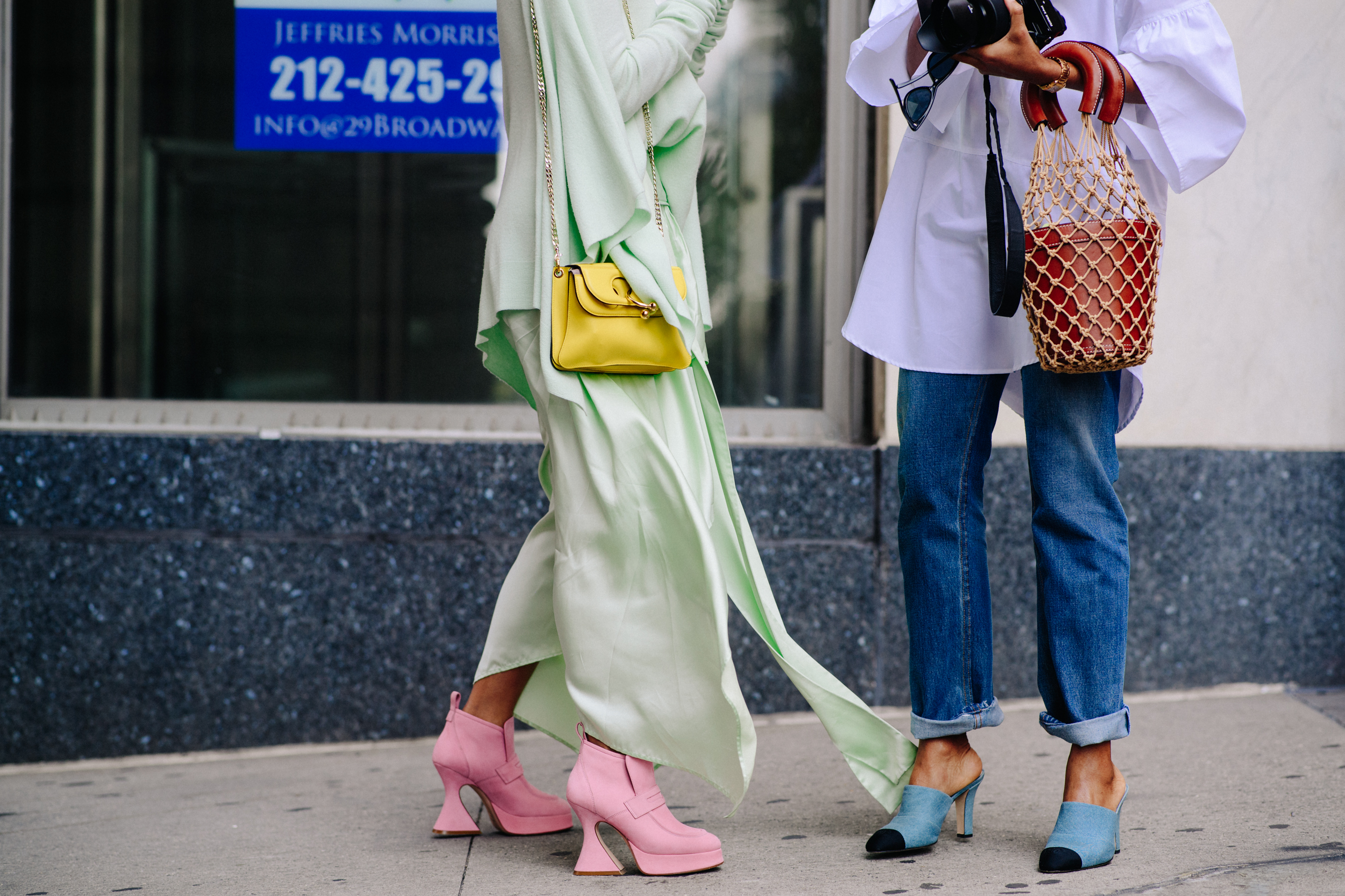 Two women wearing colourful shoes