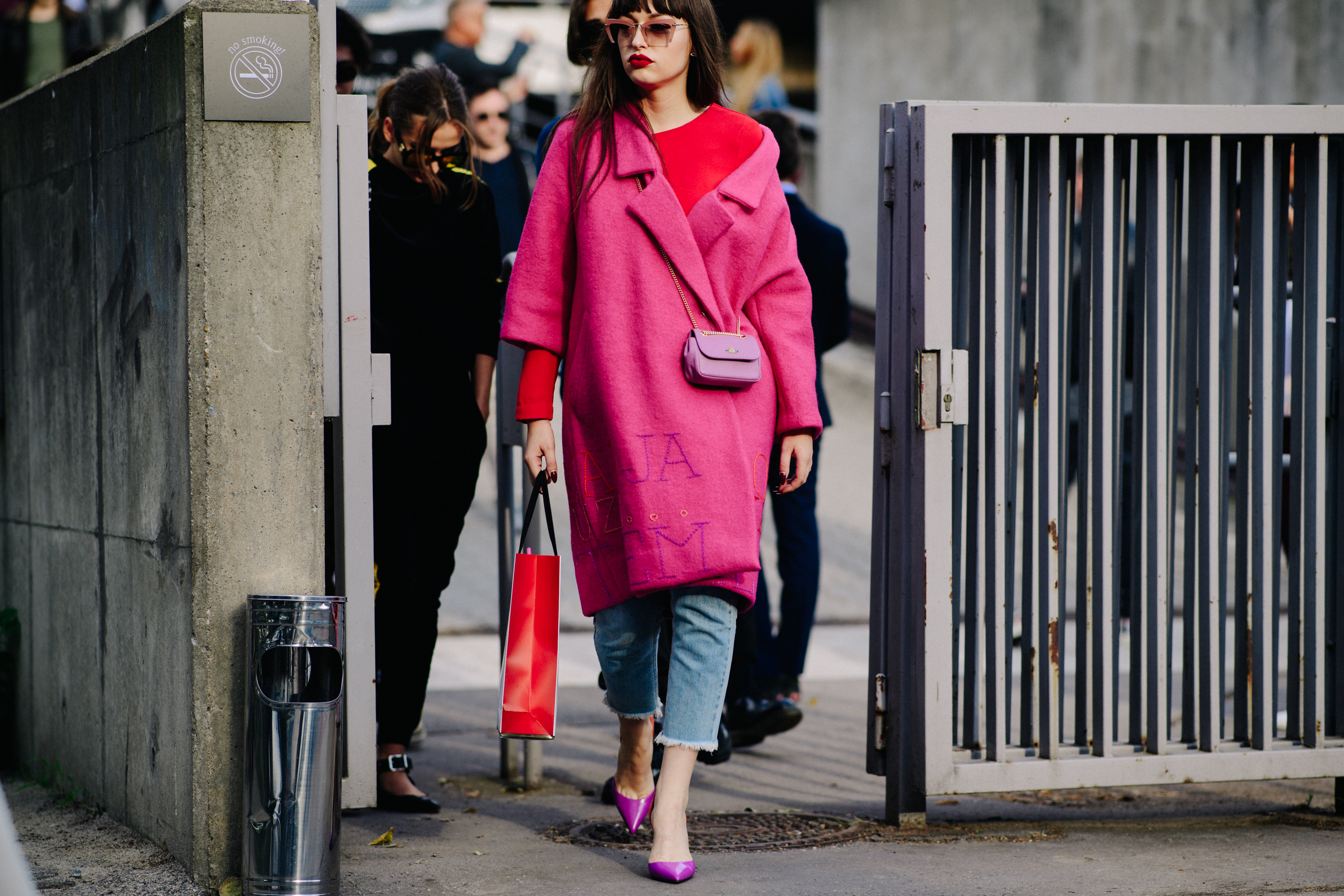 Woman wearing pink coat
