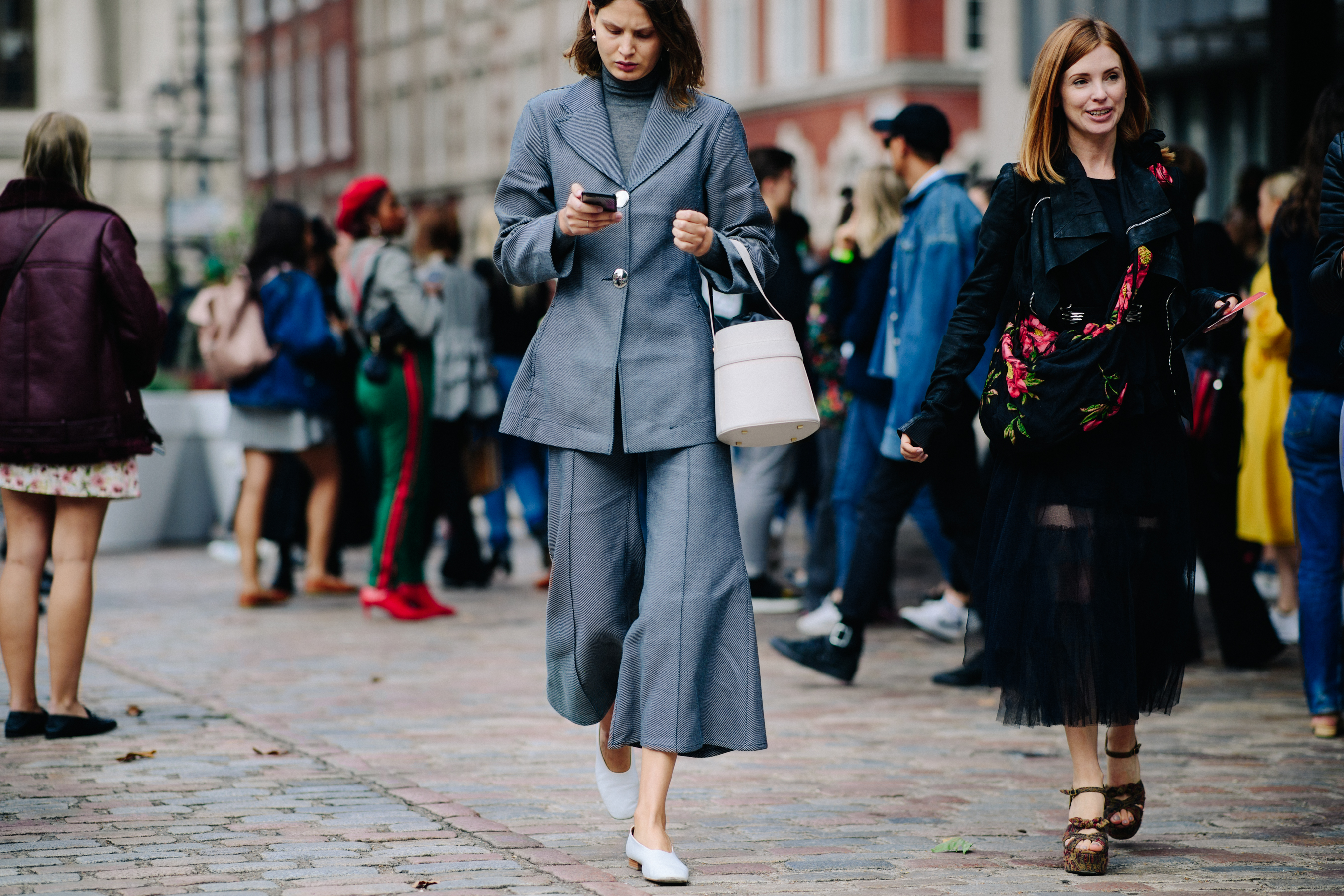Woman wearing gray suit