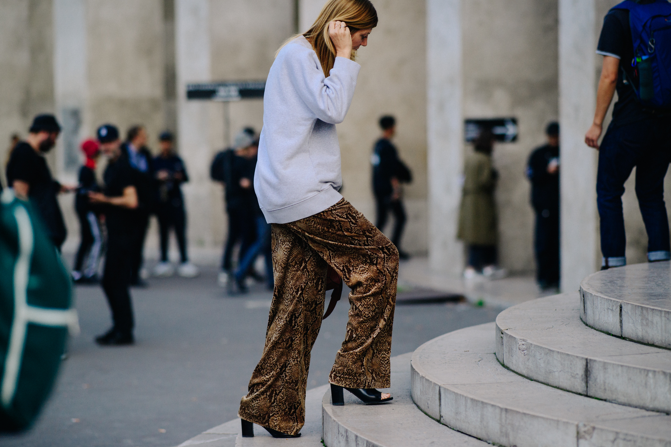 Woman wearing brown outfit before a show