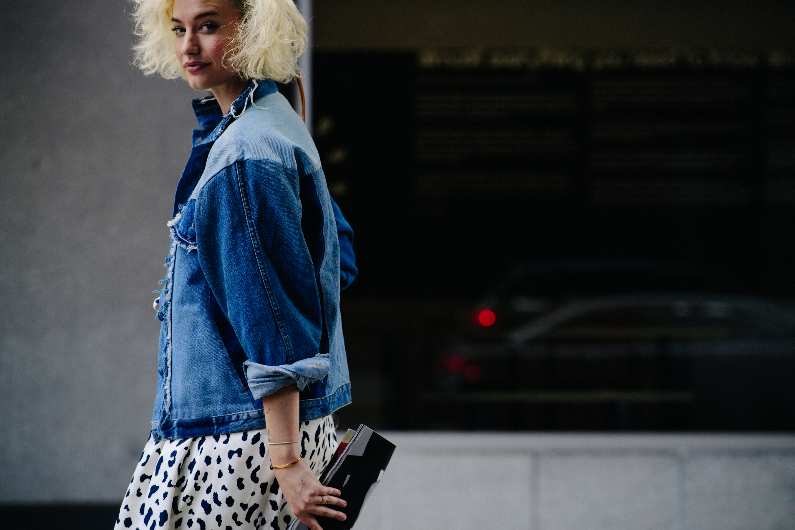 Qiwi blogger wearing denim jacket