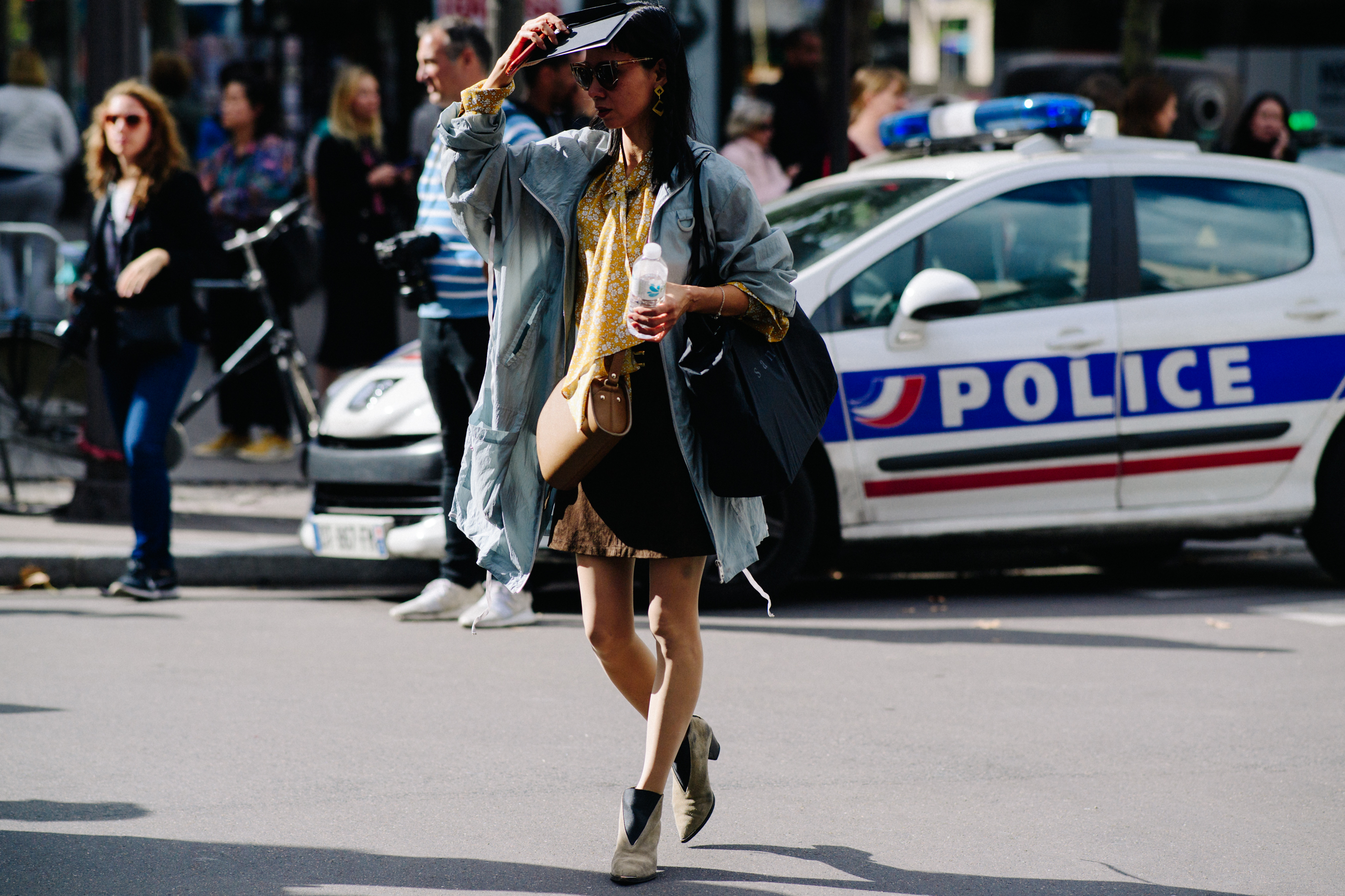 Woman wearing gray coat
