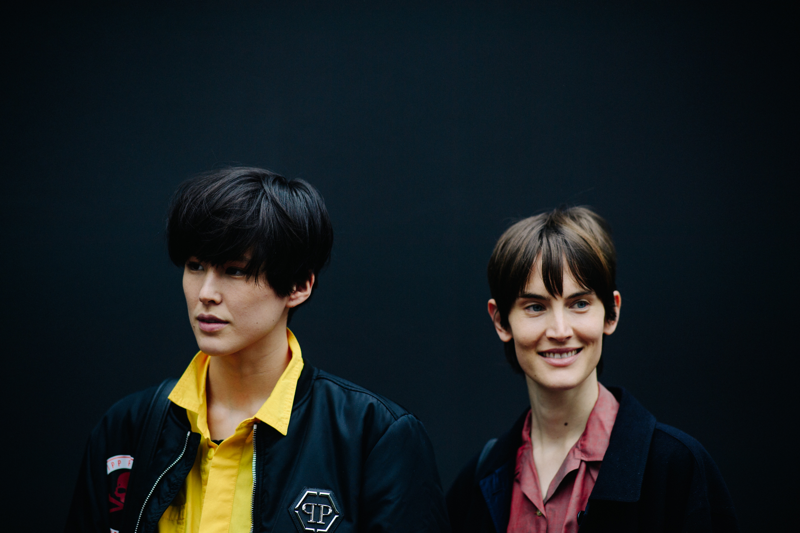 Two models with short hair