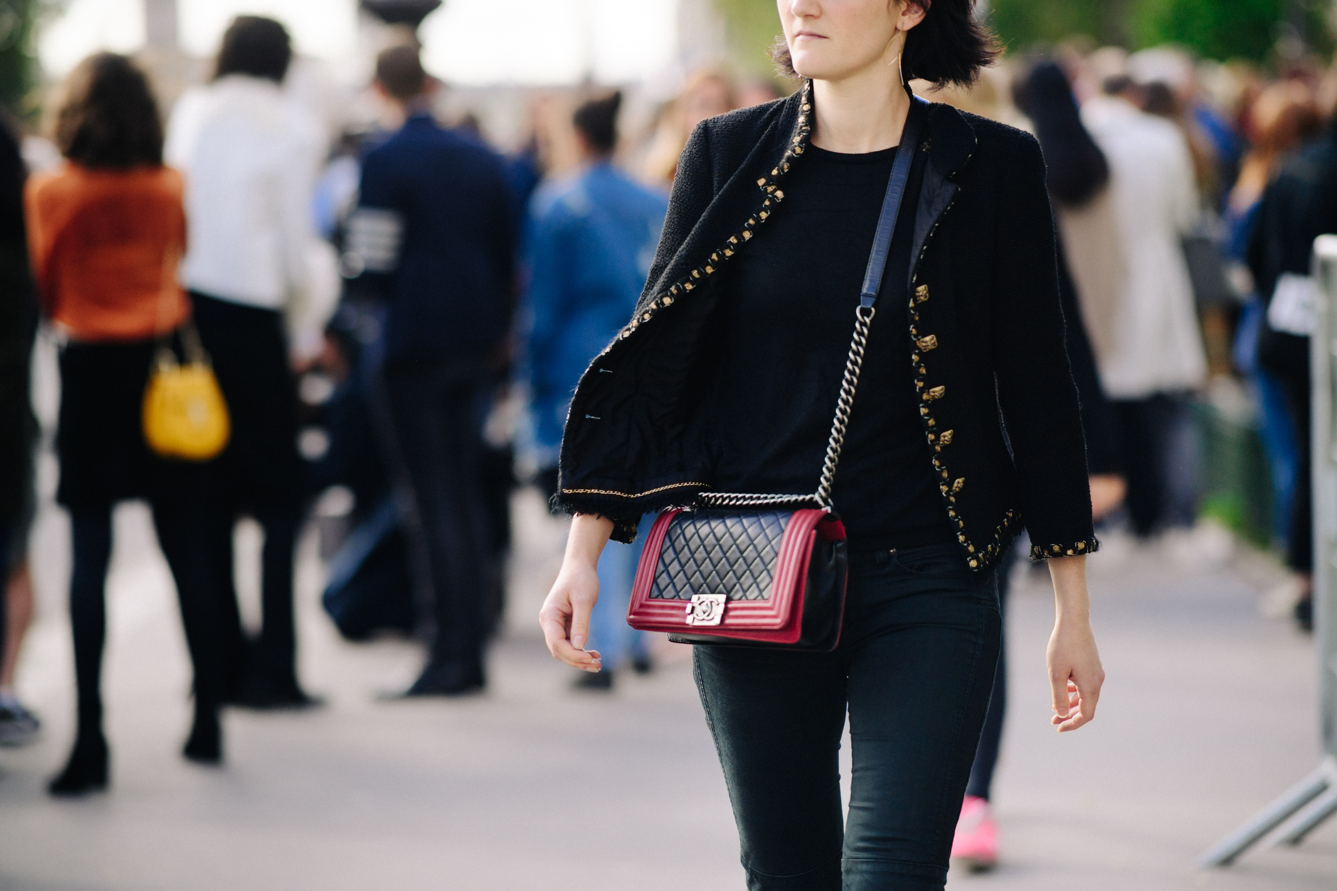 Woman wearing Chanel bag