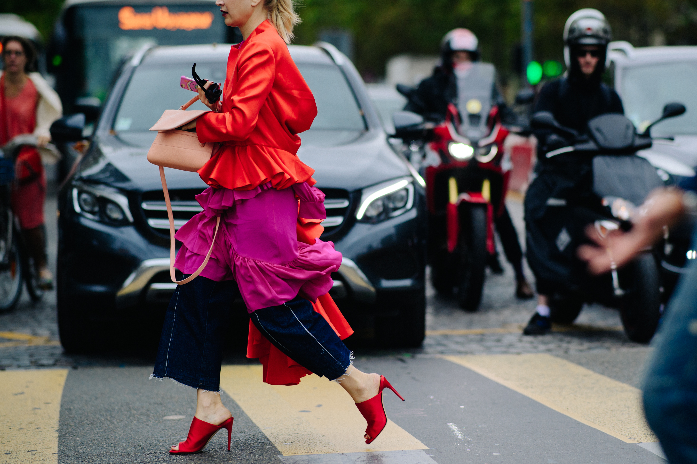 Woman wearing red and fuscia colours