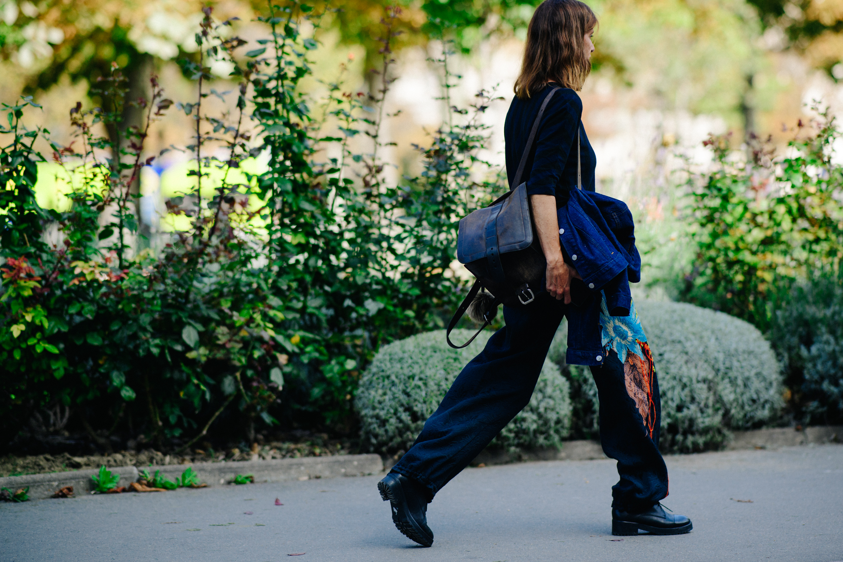 Woman with black bag after a show