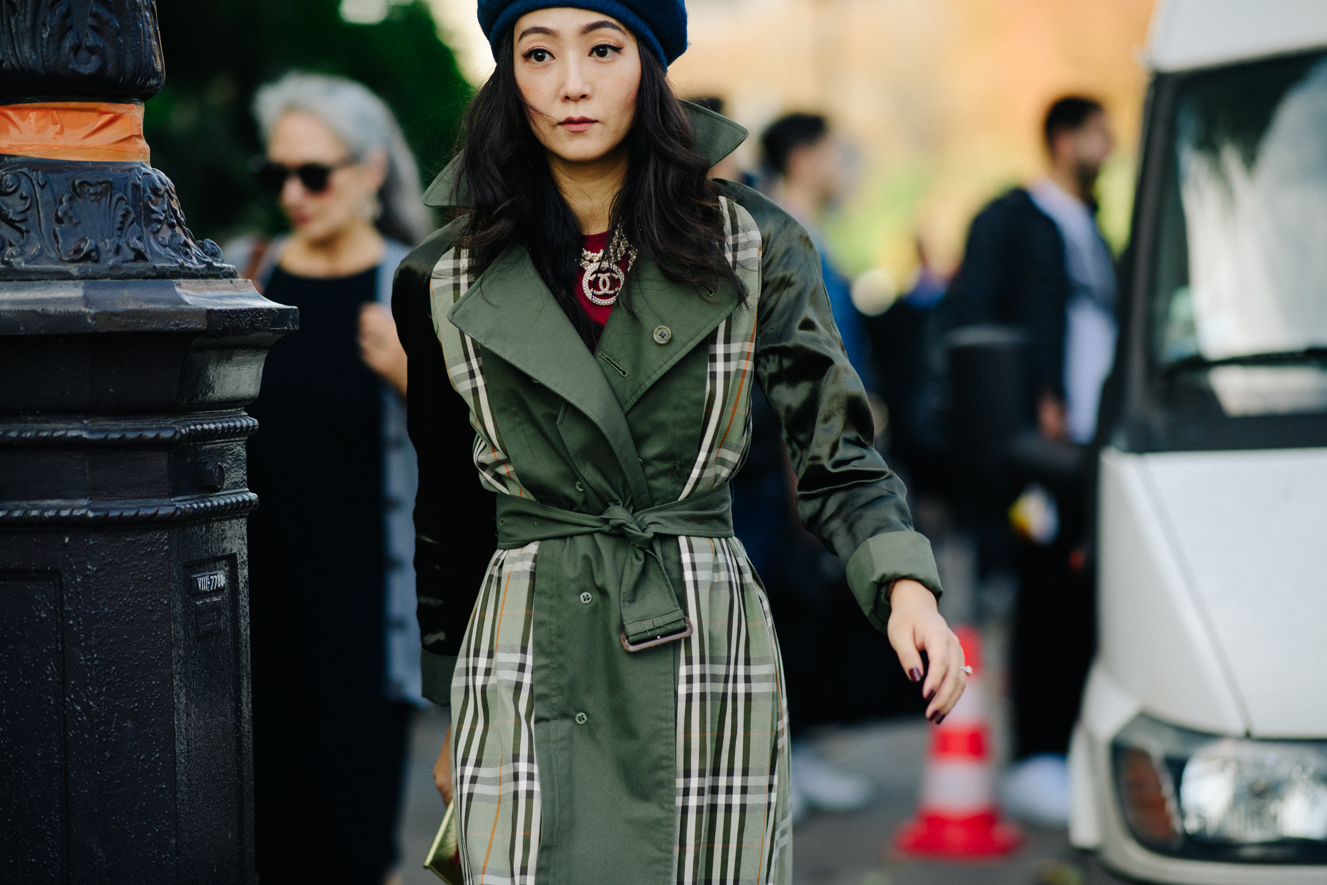 Woman wearing green leather coat