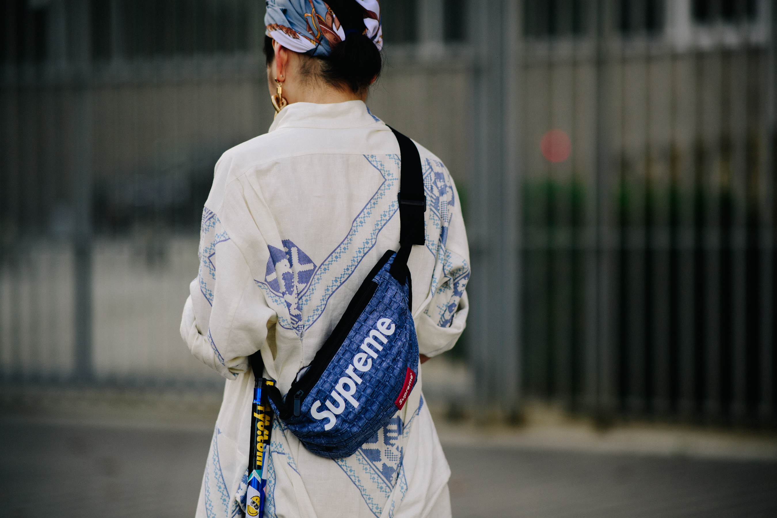 Woman wearing blue Supreme