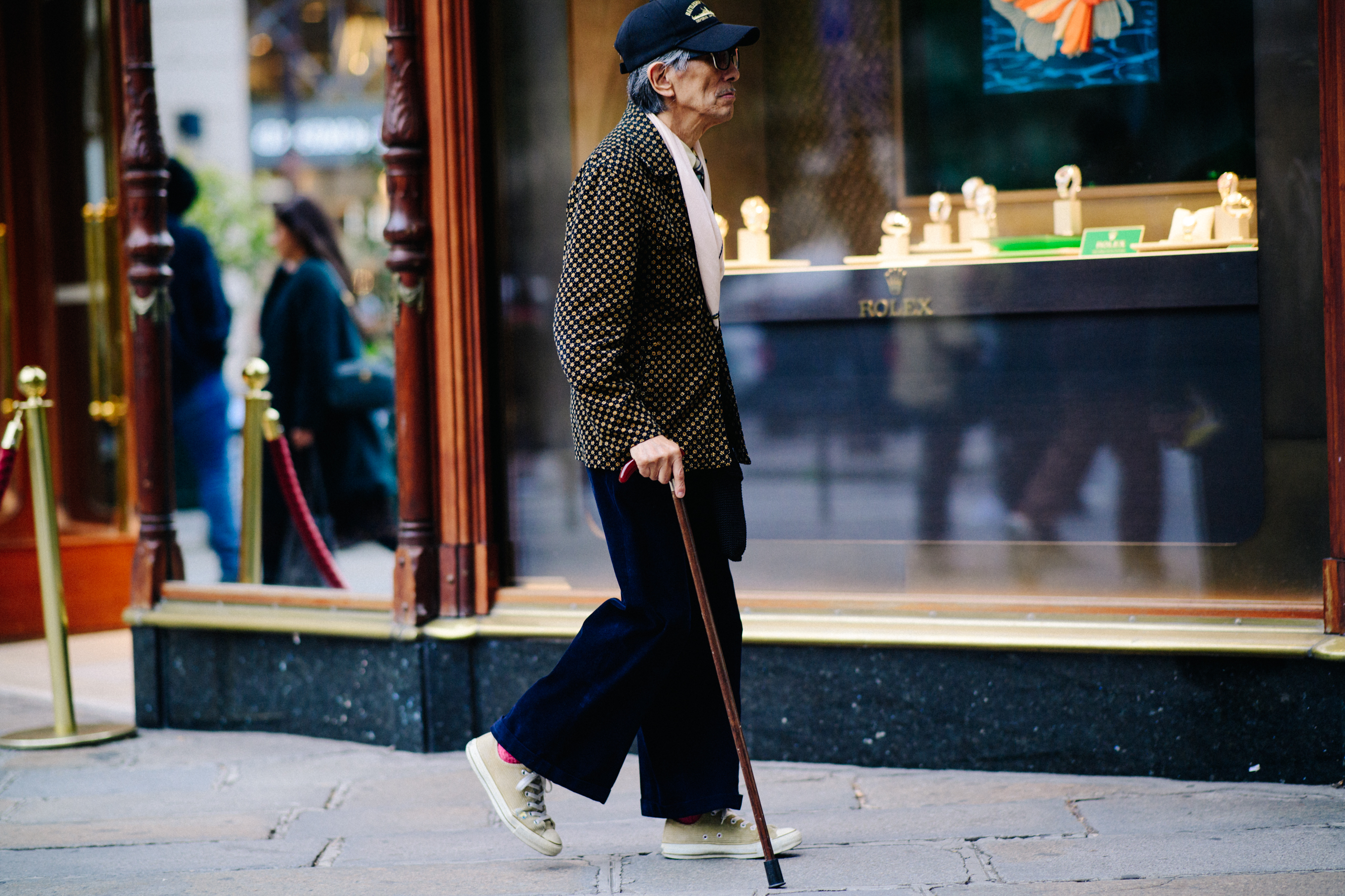 Old man wearing black trousers