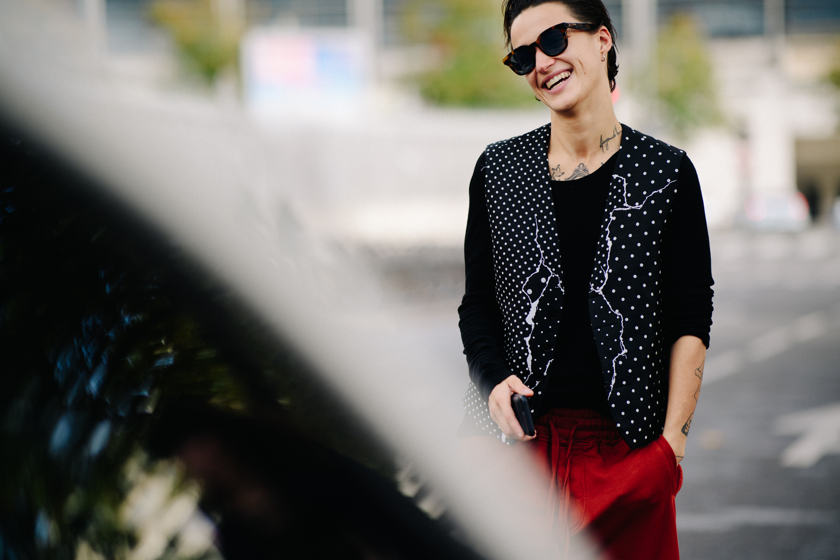 Woman with tattoos smiling