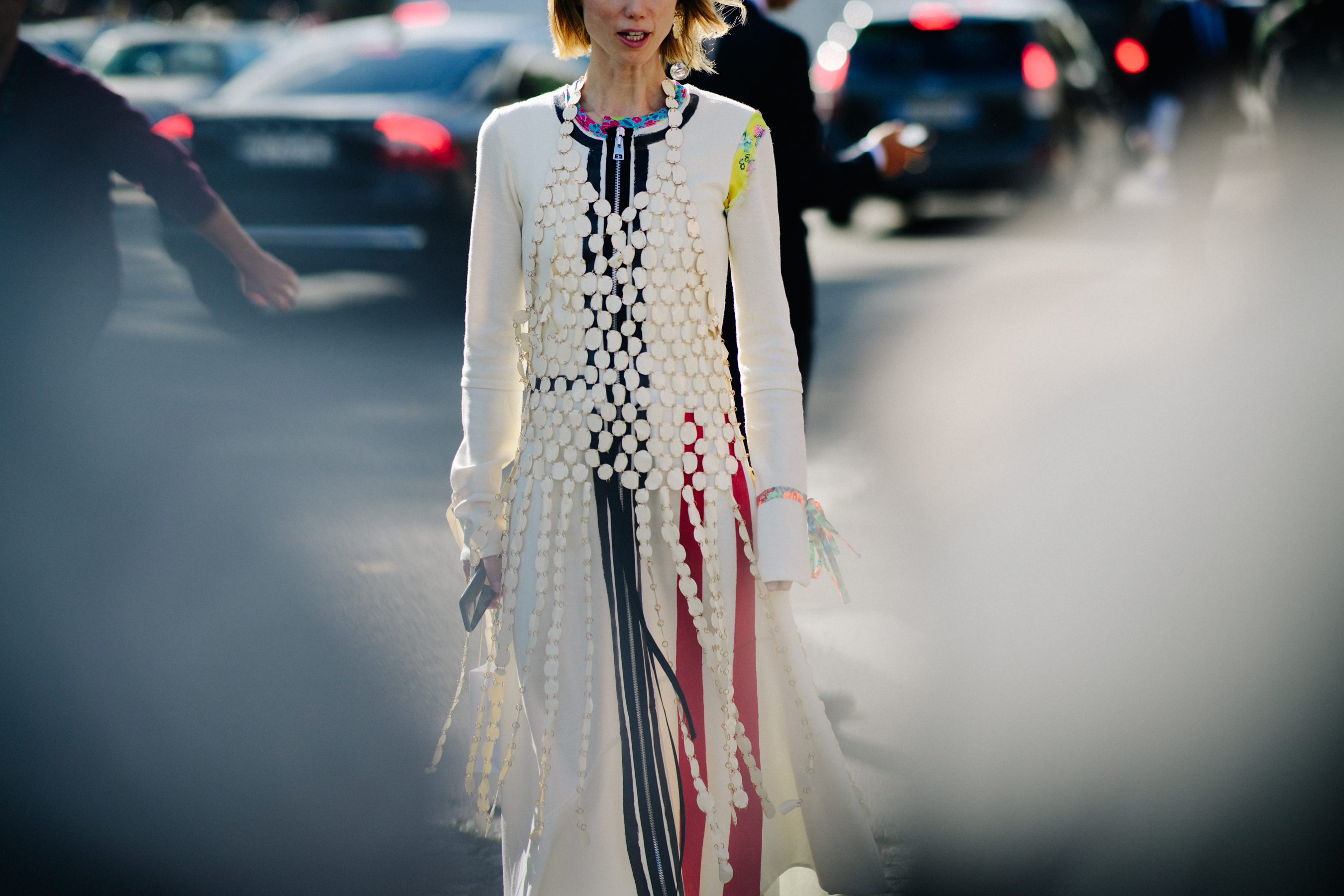 Russian stylist wearing white dress