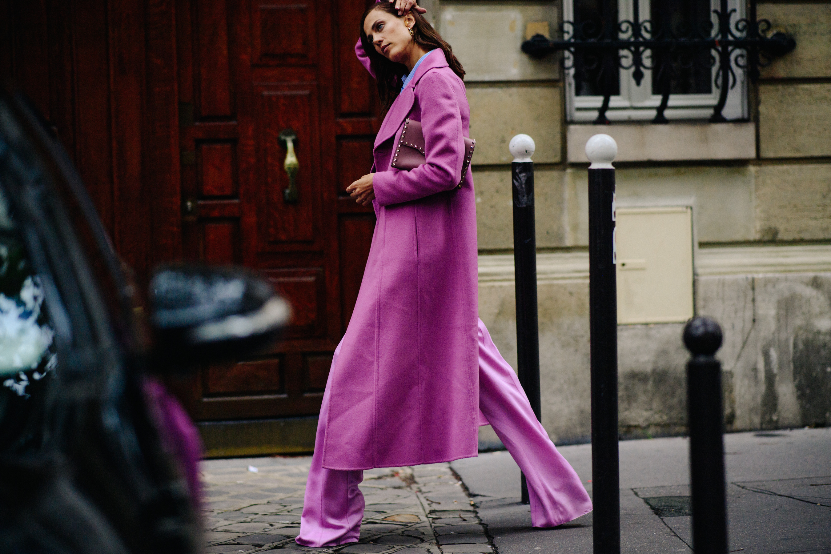 French model wearing violet outfit