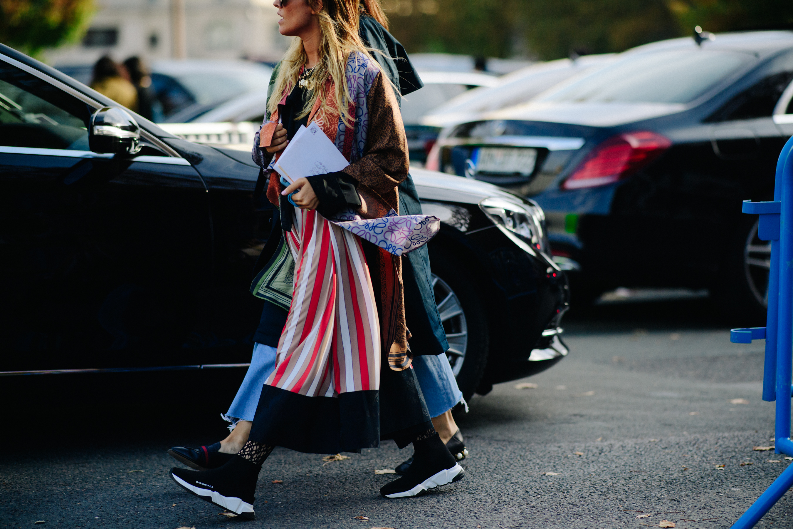 Woman wearing black Balenciaga runners