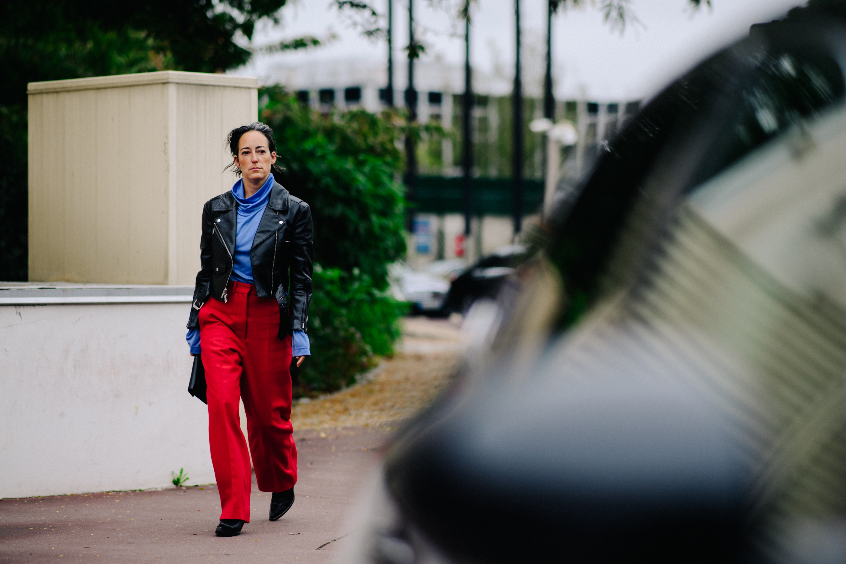 Ssense buyer wearing red trousers