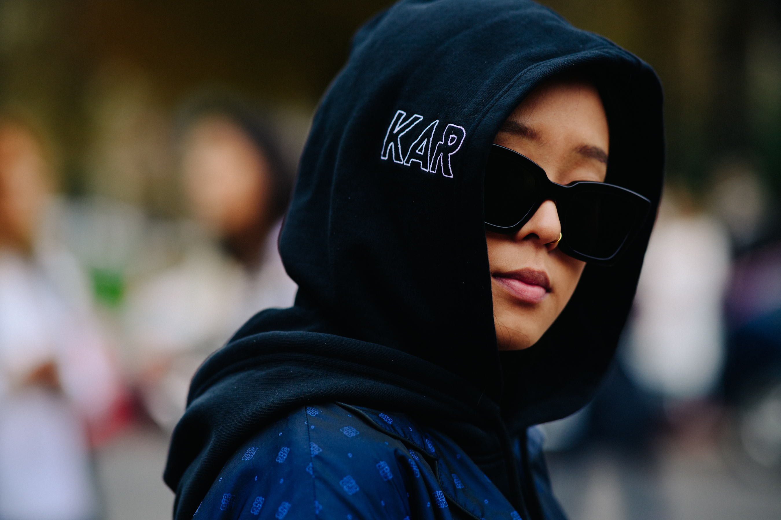Stylist wearing Arthur Kar hoodie