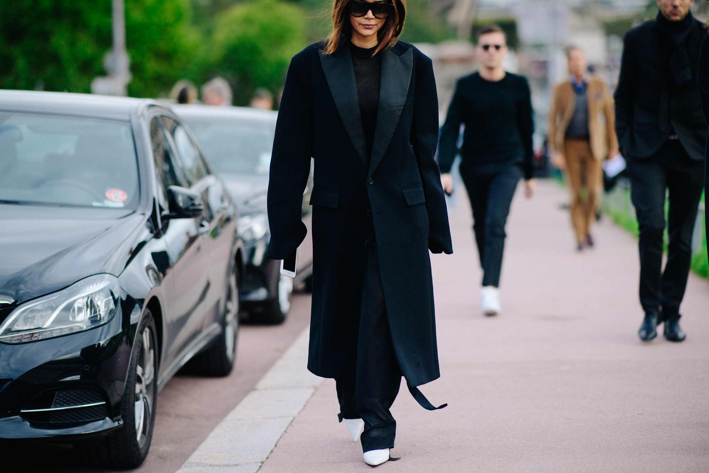 Australian VOGUE editor wearing black coat