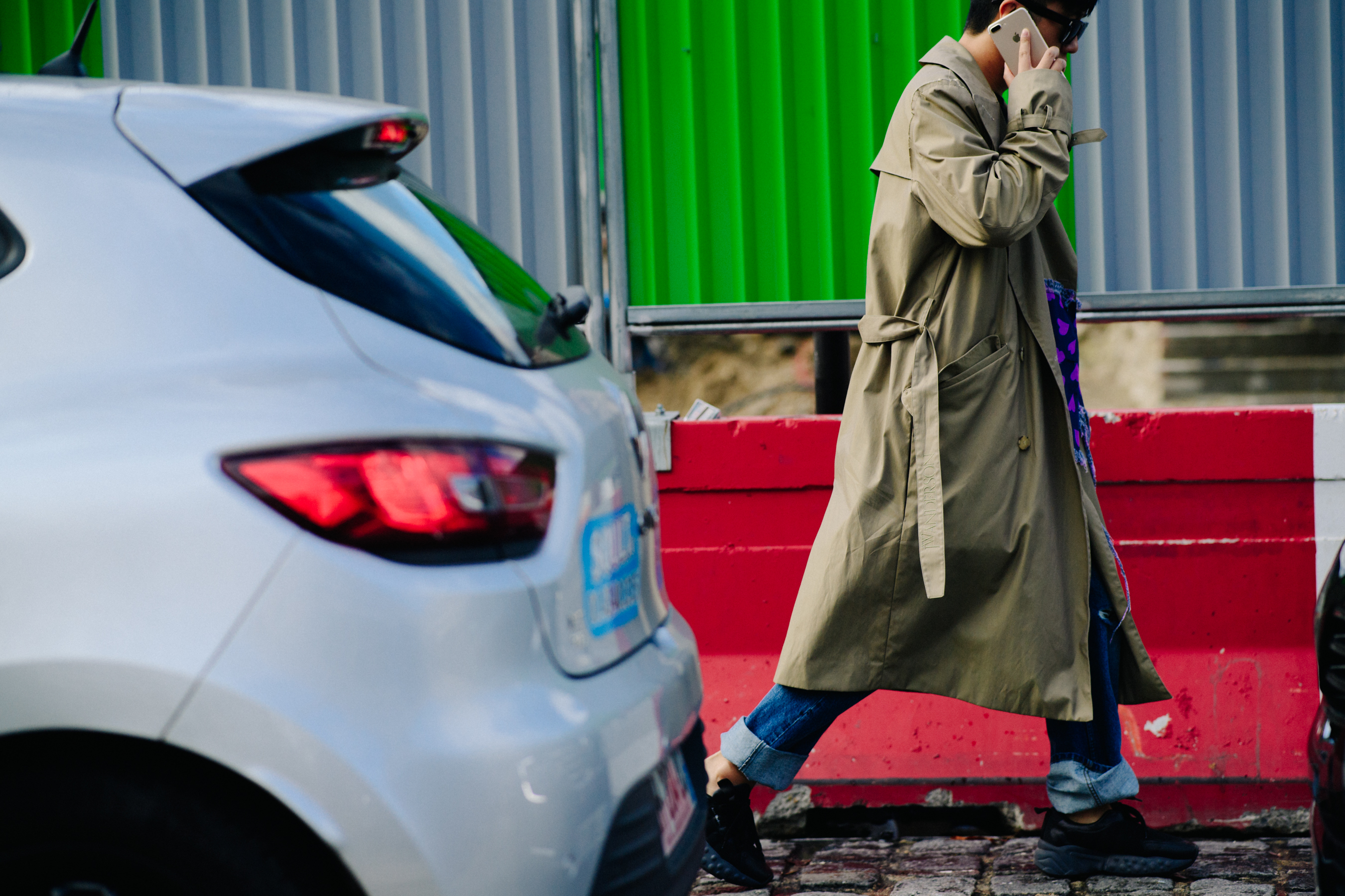 Stylist wearing long beige coat