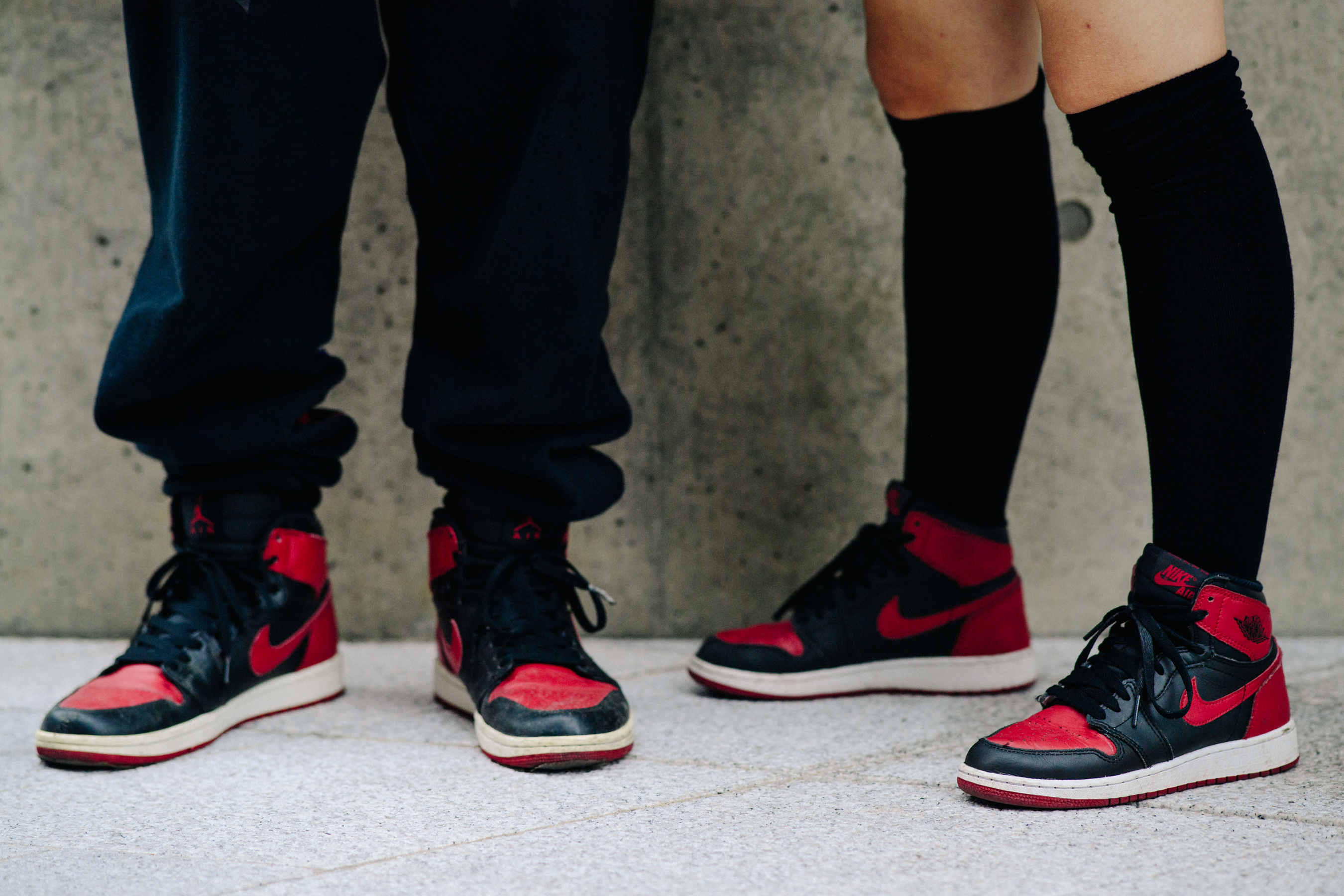 Couple wearing matching Nike Jordan sneakers
