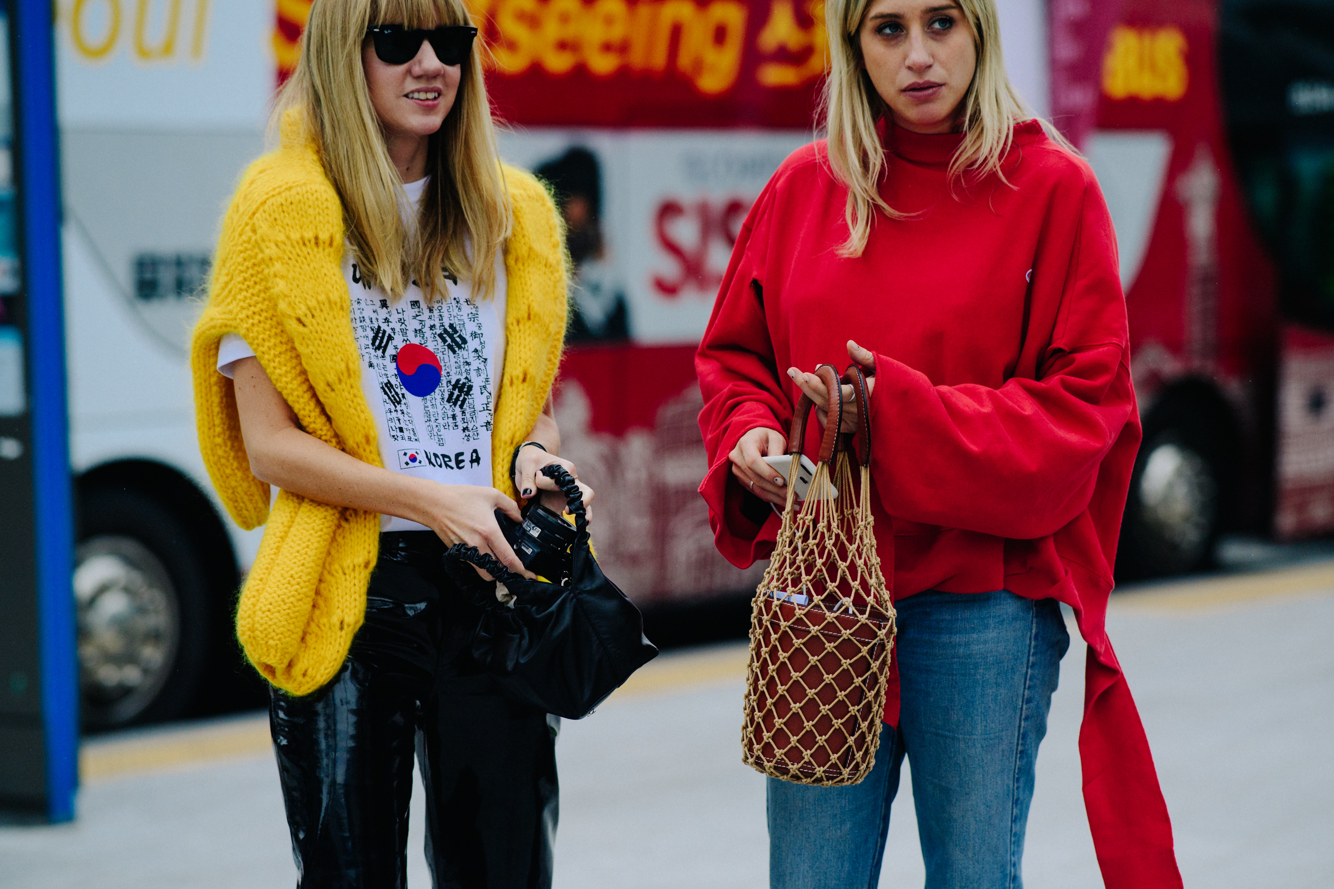 Crop of two women in colourful sweaters