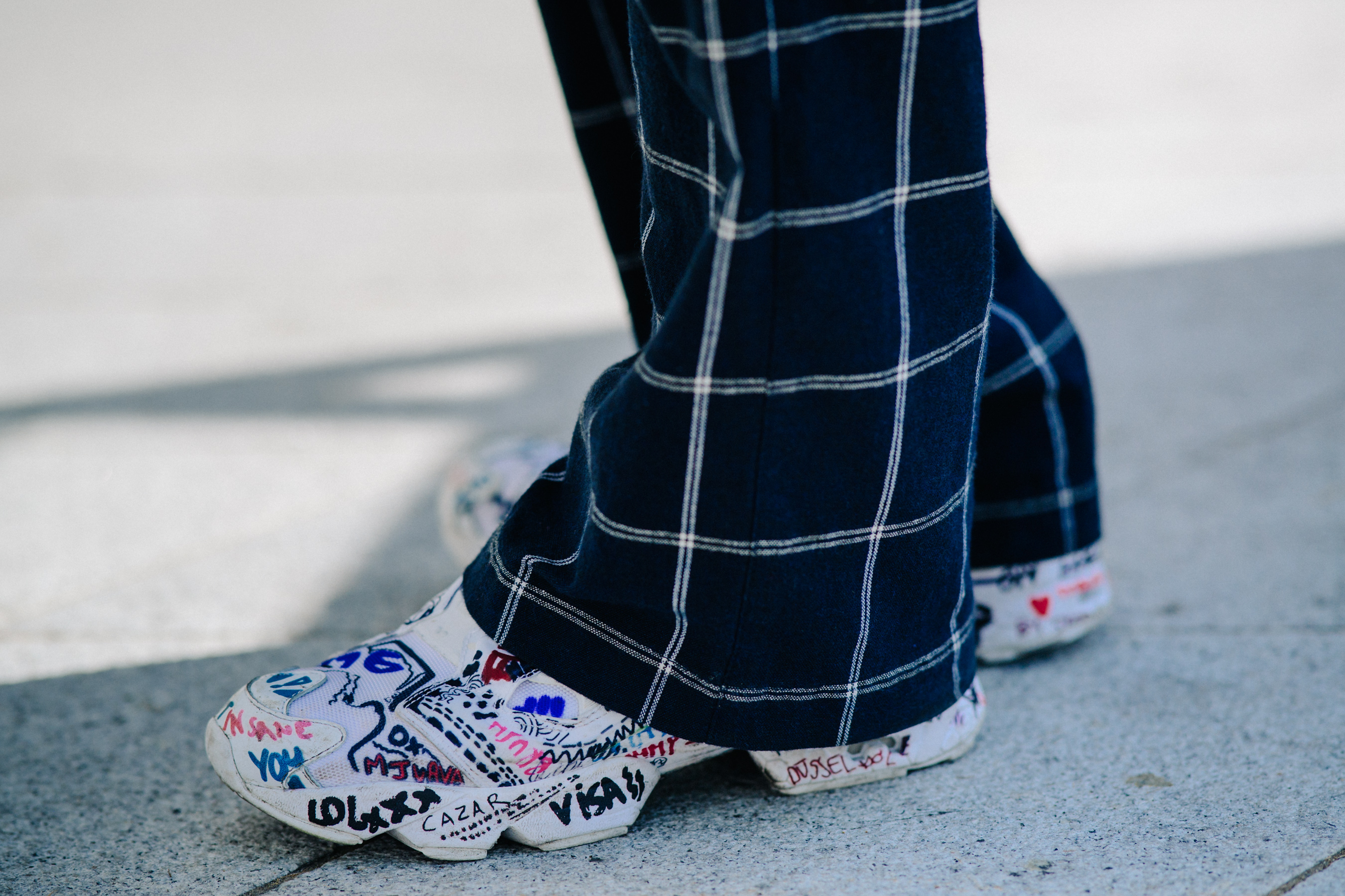 Closeup of White Vetements x Reebok sneakers
