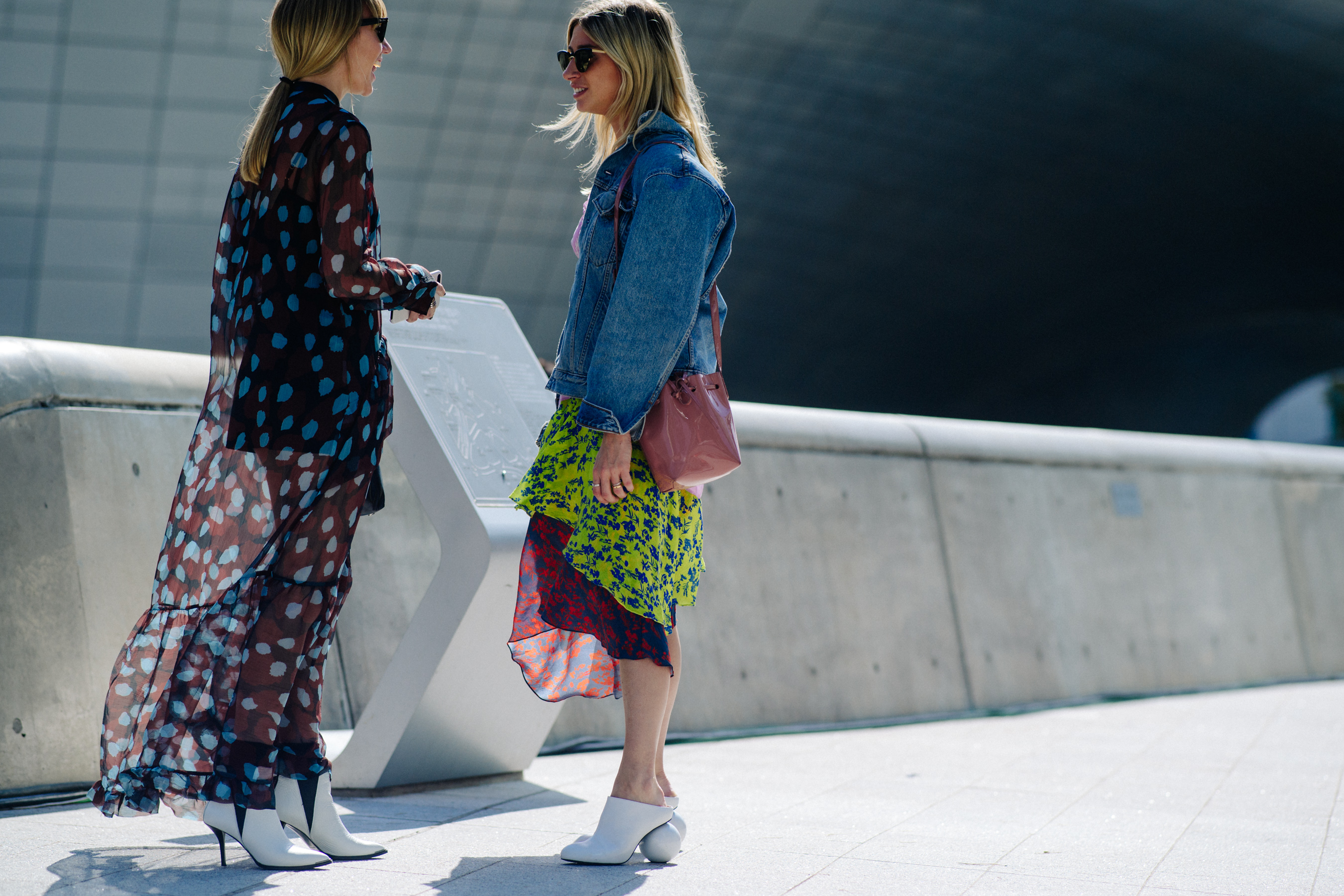 Two women in pattern dresses