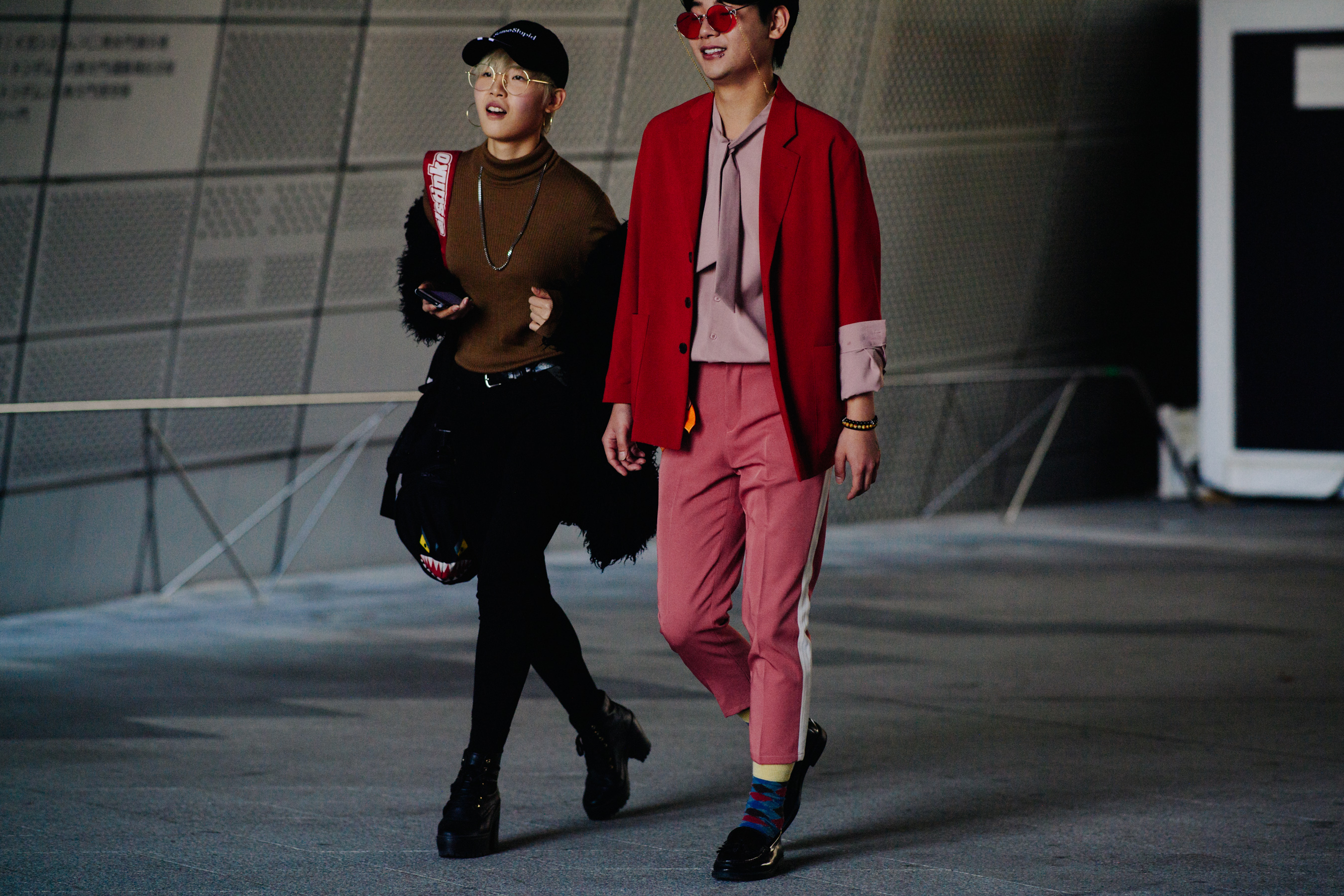 Couple wearing sunglasses and chains